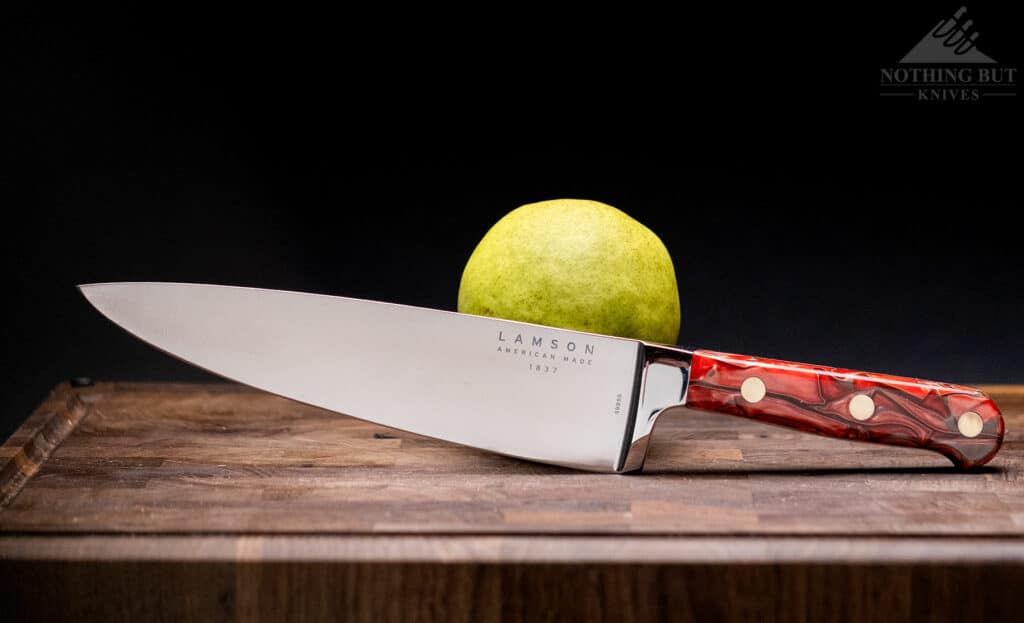 A full length profile image of the Lamson Premier Fire Forged chef knife that showcases it's unique looking handle. 