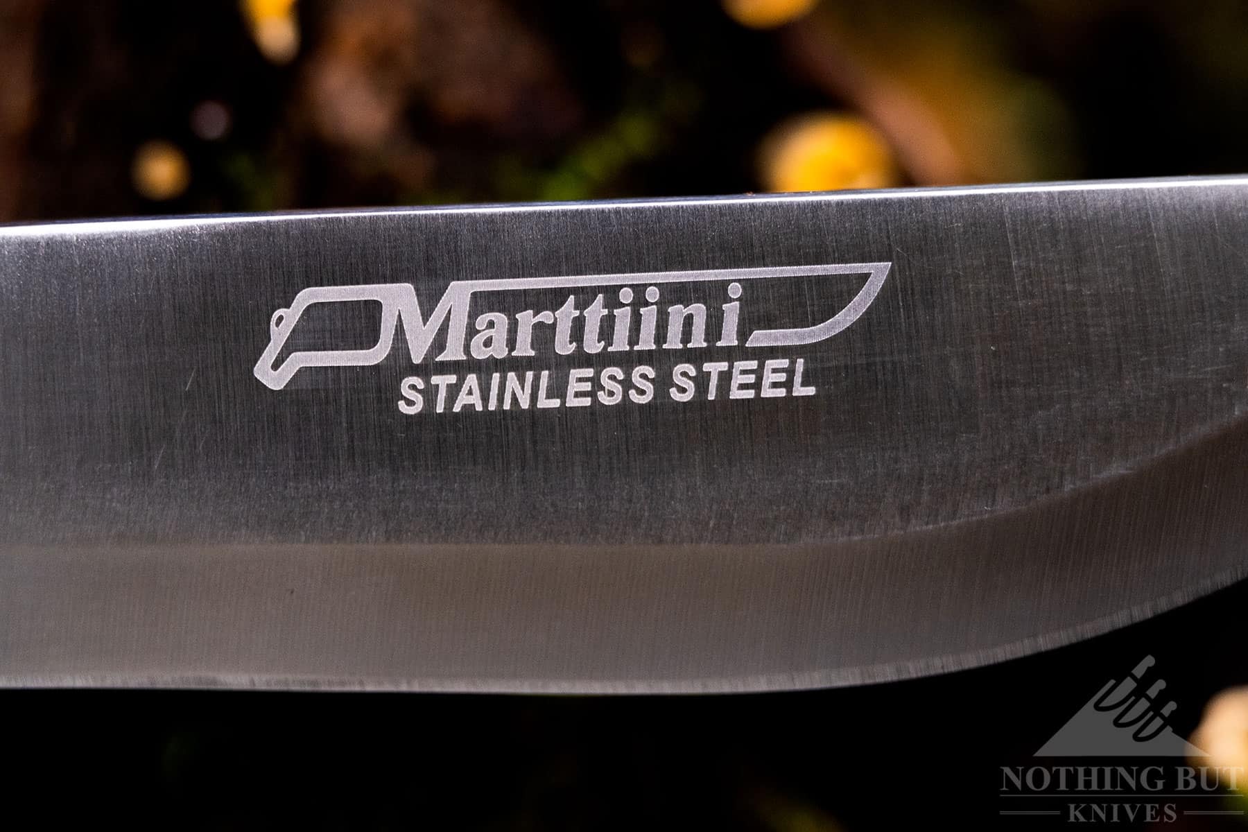 Close up of the Marttiini Full Tang knife blade and logo. 