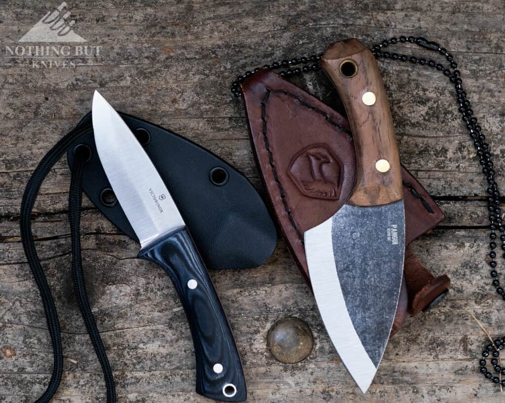 Two of the best neck knives with great sheaths we tested for this article. The Victorinox Outdoor Master Mic is on the left and the Condo Pangui is on the right.