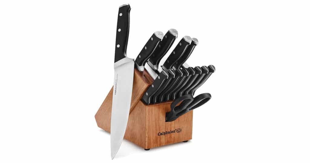 The Calphalon Classic 15 piece knife set with self sharpening block. Shown here with the chef knife outside the storage block on a white background.