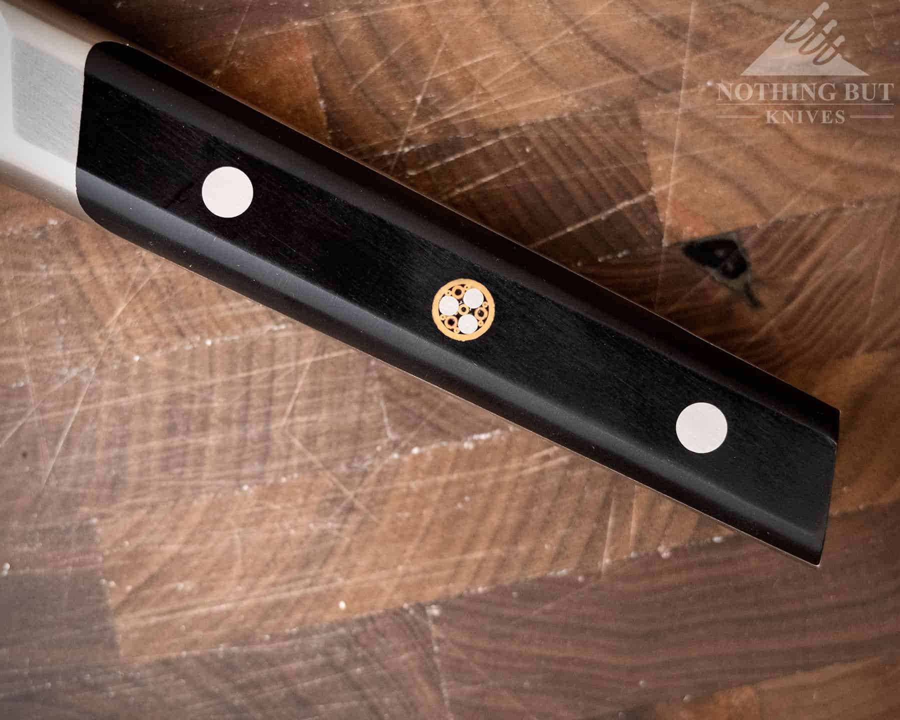 Cangshan Tc Chef'S Knife Review - Image 8 A close up of the handle profile that illustrates it's unique almost octagon shape.