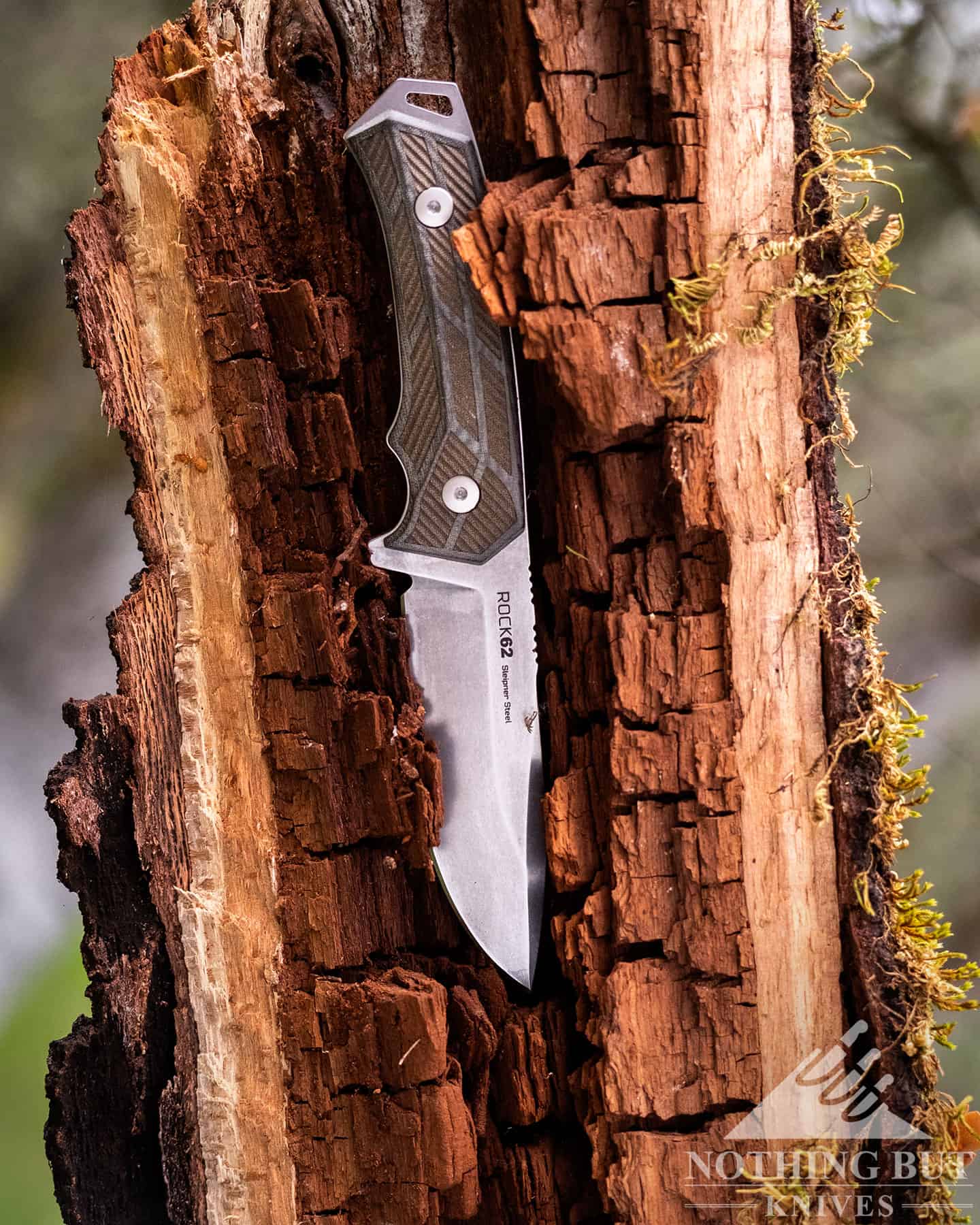 This image shows the Rock 62 knife's right side profile with the model and steel information printed on the blade. 