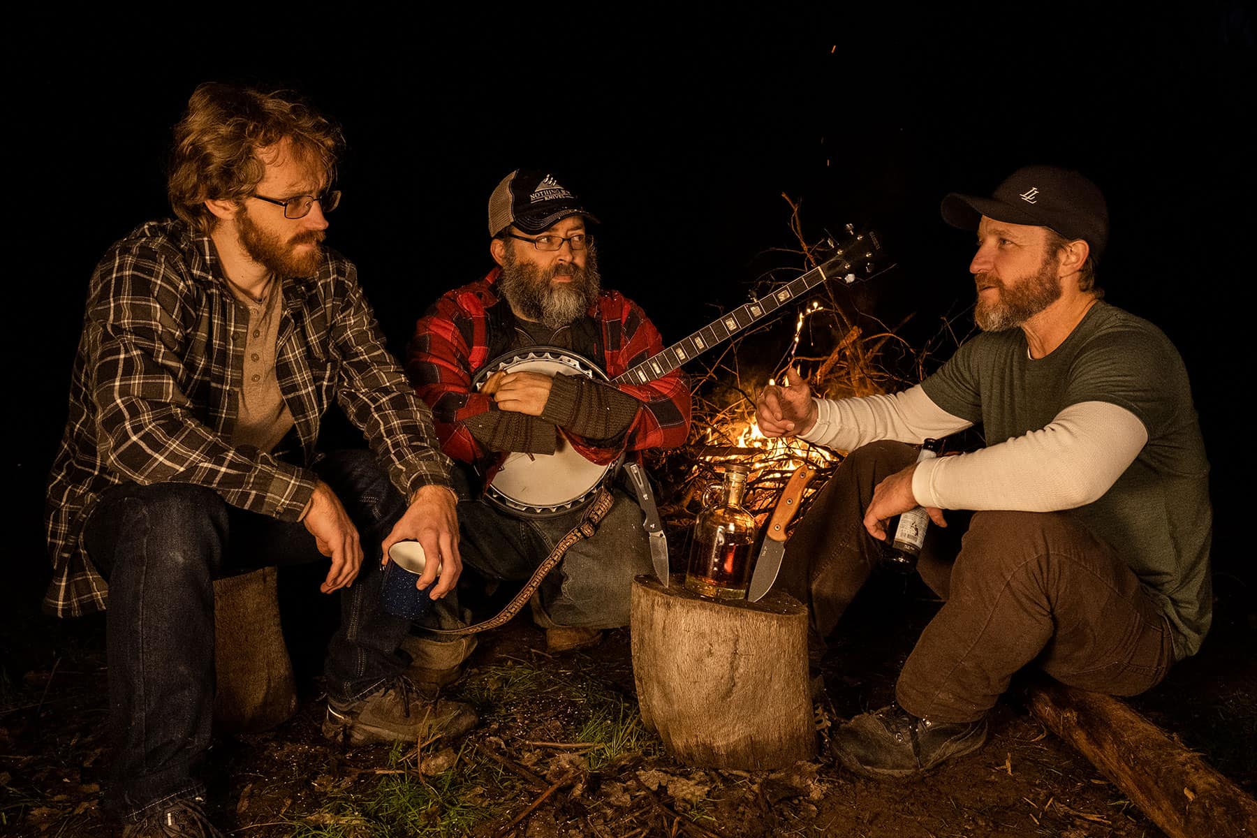Three drunk hillbillies sitting around a fire arguing about which knives are the best.