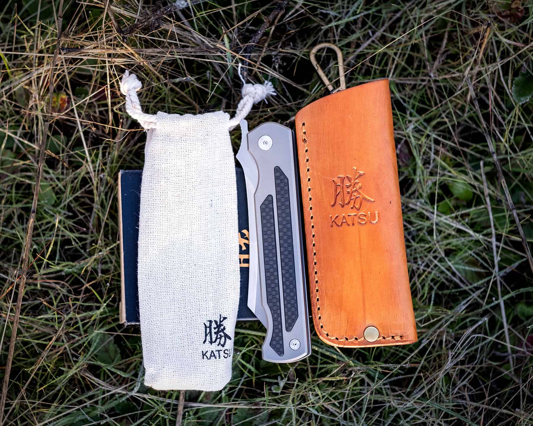 Katsu Jt01 Camping Knife Review - Image 2 The katsu JT01 Titanium Camping Knife ships with a lot of packaging and accessories. This makes it a decent gift option.