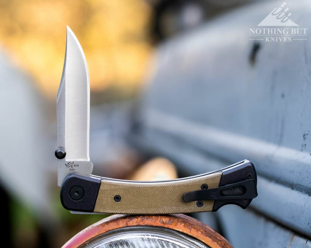 The Buck 110 Hunter Sport is one of the best versions of the 110 to be released. Pictured here outdoors on an antique tractor.