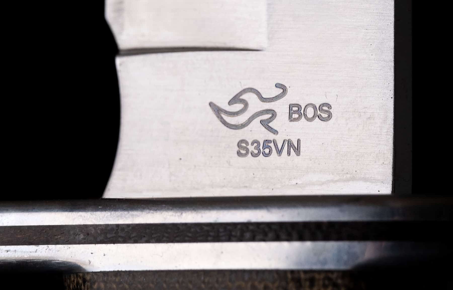 Buck knives made with S30V, S35V or S45V steel have an excellent heat treatment. This image features a blade with the BOS heat treatment logo to help consumers identify Buck's high quality steel knives. 