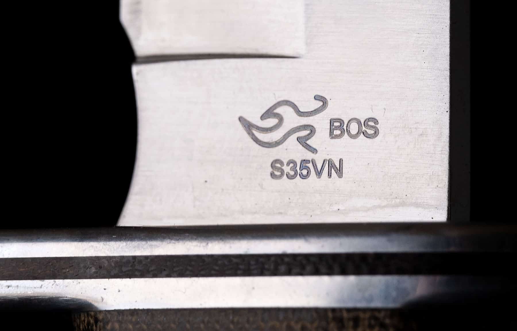 10 Buck Knives With S30V, S35V And S45Vsteel - Image 1 Buck knives made with S30V, S35V or S45V steel have an excellent heat treatment. This image features a blade with the BOS heat treatment logo to help consumers identify Buck's high quality steel knives.