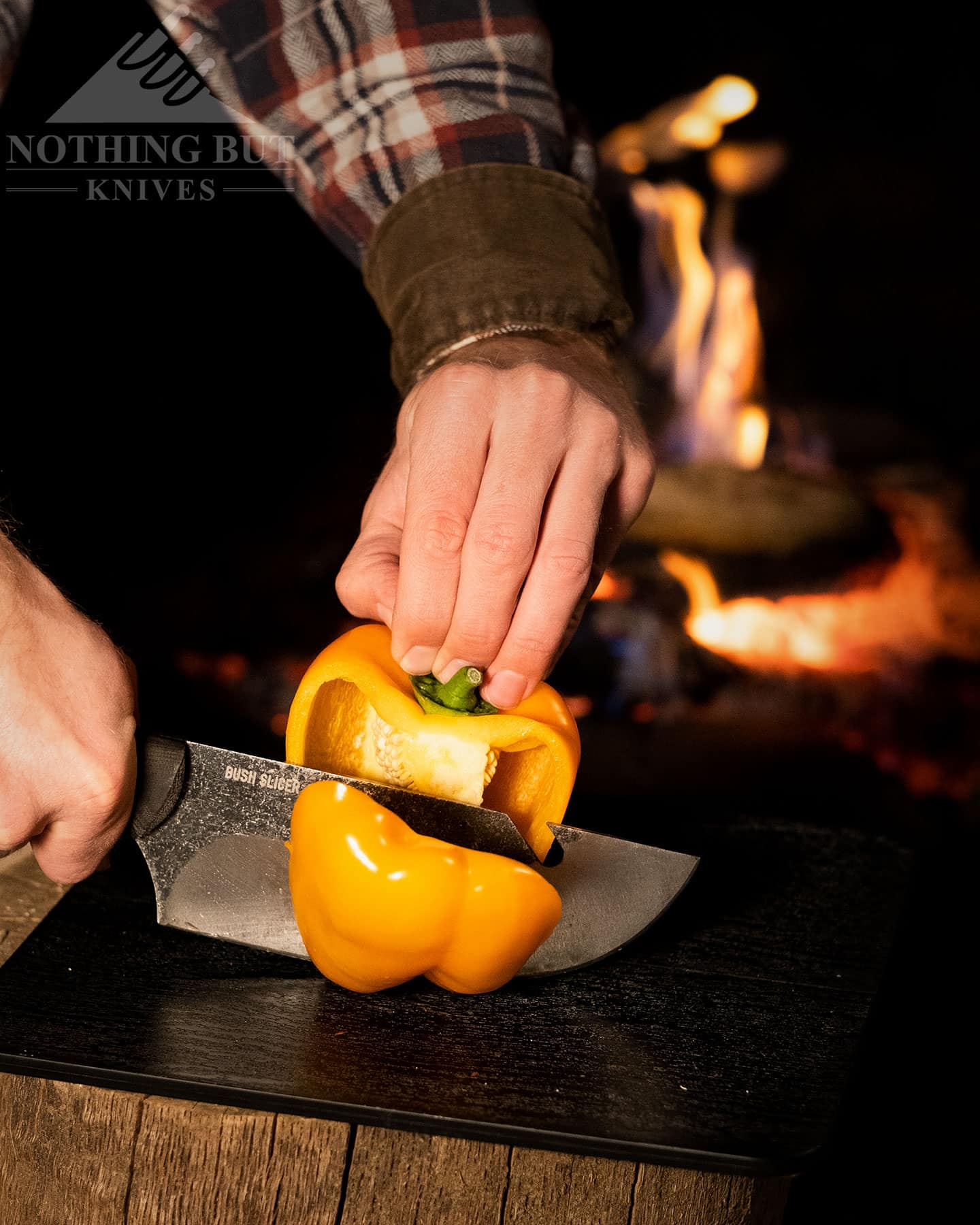 The Condor Bushslicer cutting a bell pepper to show how ell it performs at campsite food prep. 