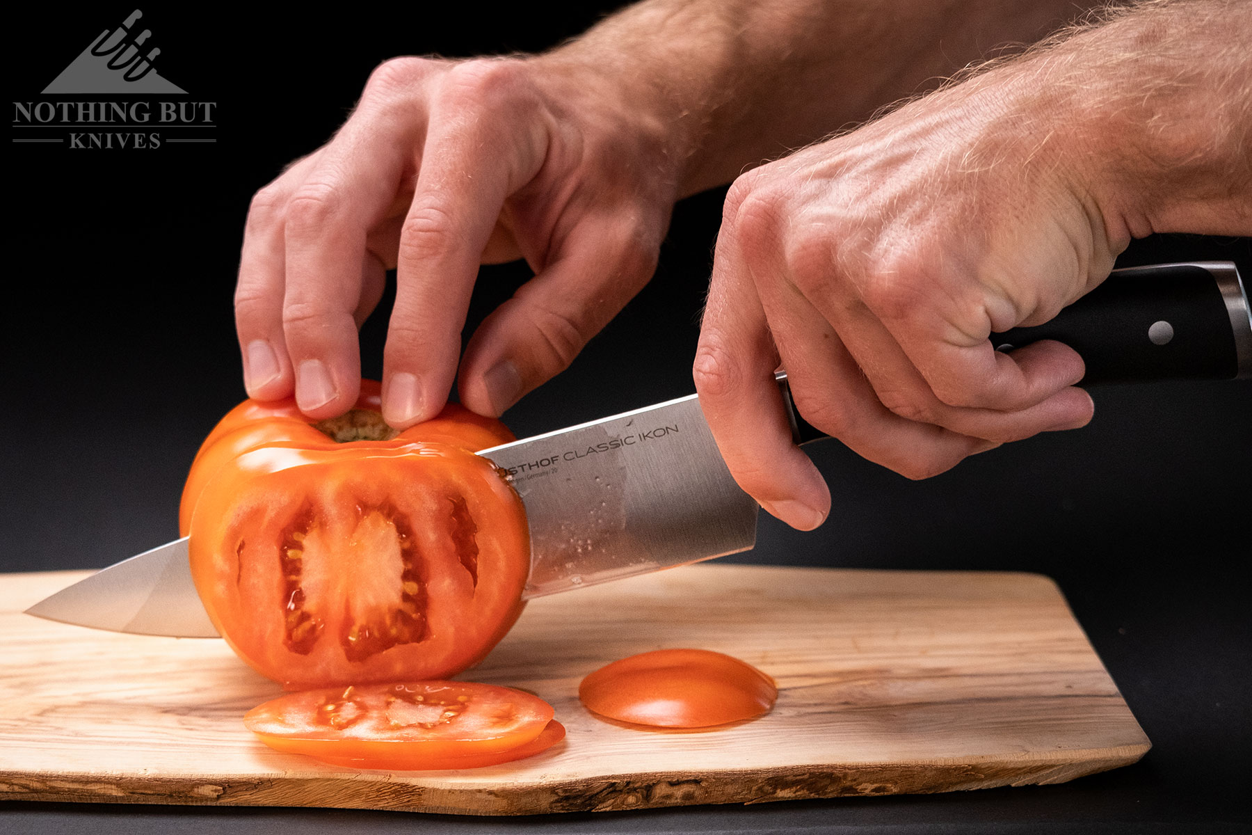 The Wusthof Classic Ikon 8 inch chef knife is a slightly cheaper alternative to the Zwilling By Kramer Euro Stainless Essential chef knife.