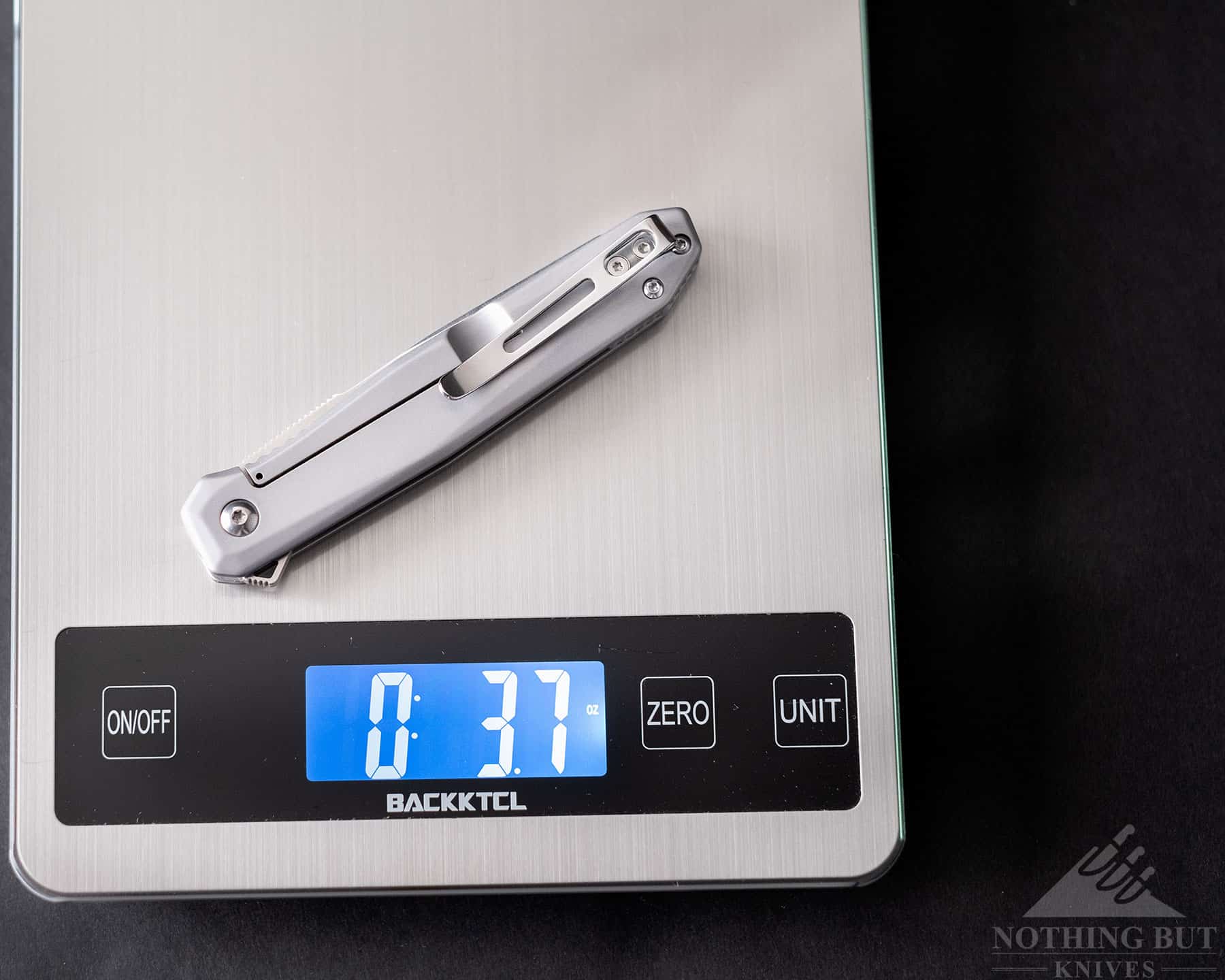 This image of the CRKT Facet pocket knife on a scale shows it's weight.