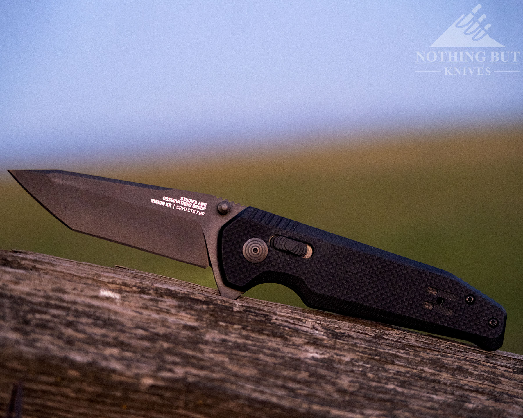 A close-up of SOG Vision folding knife with the XR slide lock facing forward.