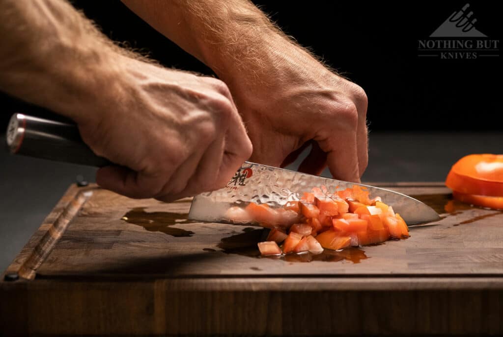 Dicing a tomato with the Miyabi Mizu chef knife is fun and fairly effortless.   