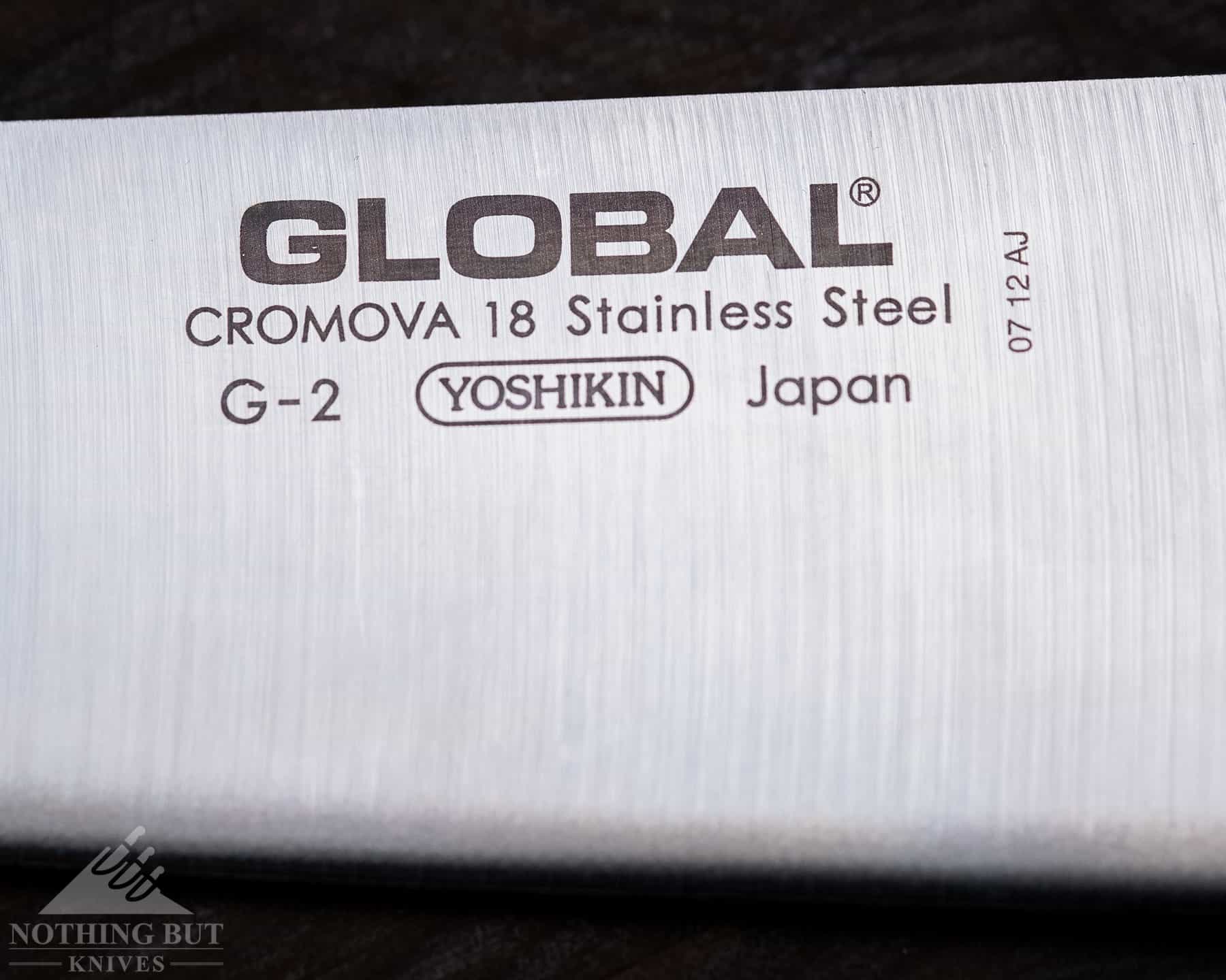 Global G-2 8 Inch Chef'S Knife Review - Image 4 A macro image of the steel stamp on the Global G2 blade to show the steel type used.
