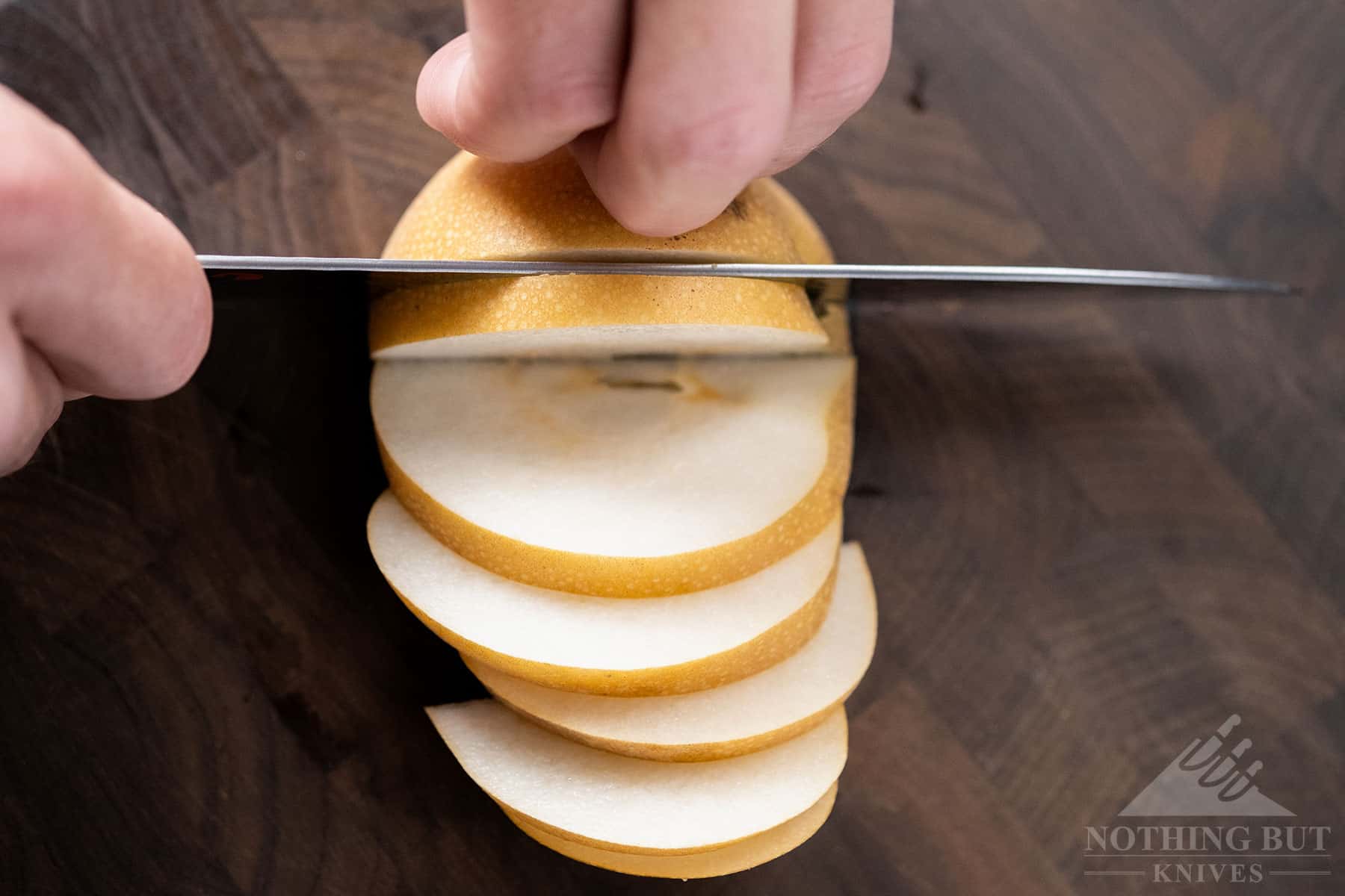 This image shows the rounded spine of the Miyabi Mizu SG2 chef knife. 