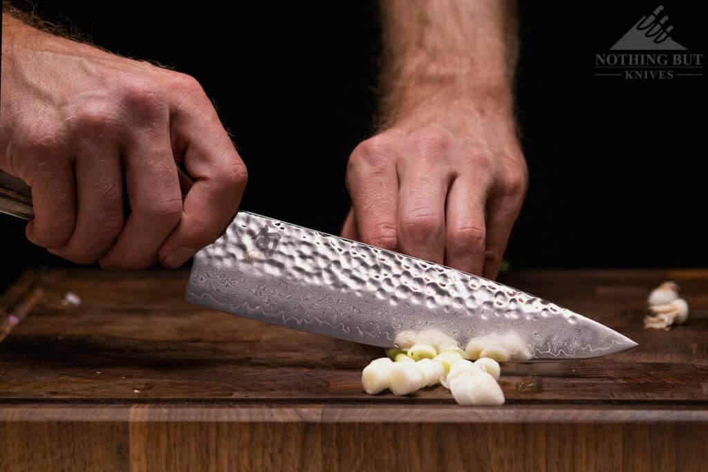 Dicing green onions with the Shun Premier 8 inch chef knife.