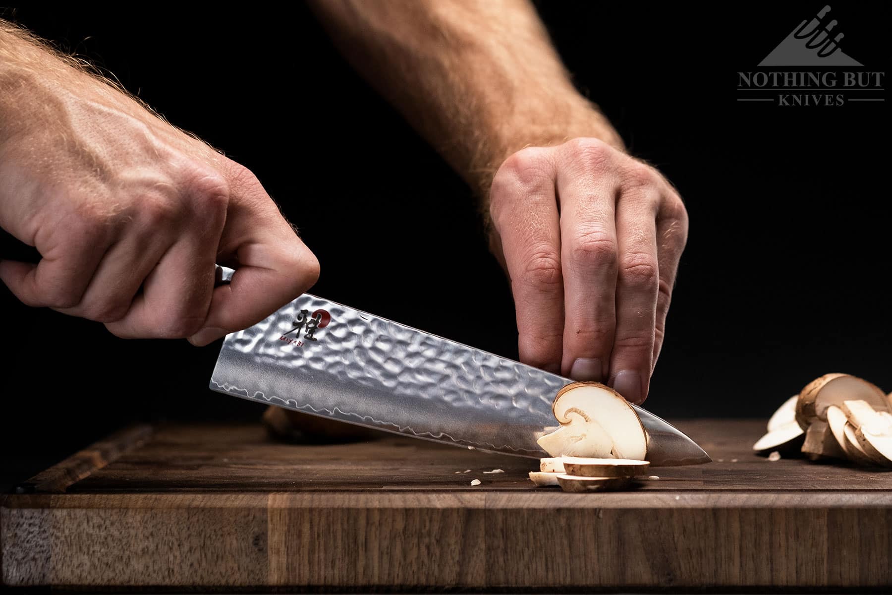 https://www.nothingbutknives.com/wp-content/uploads/2022/06/Slicing-Mushrooms-With-The-Myabi-SG2-Chef-Knife.jpg