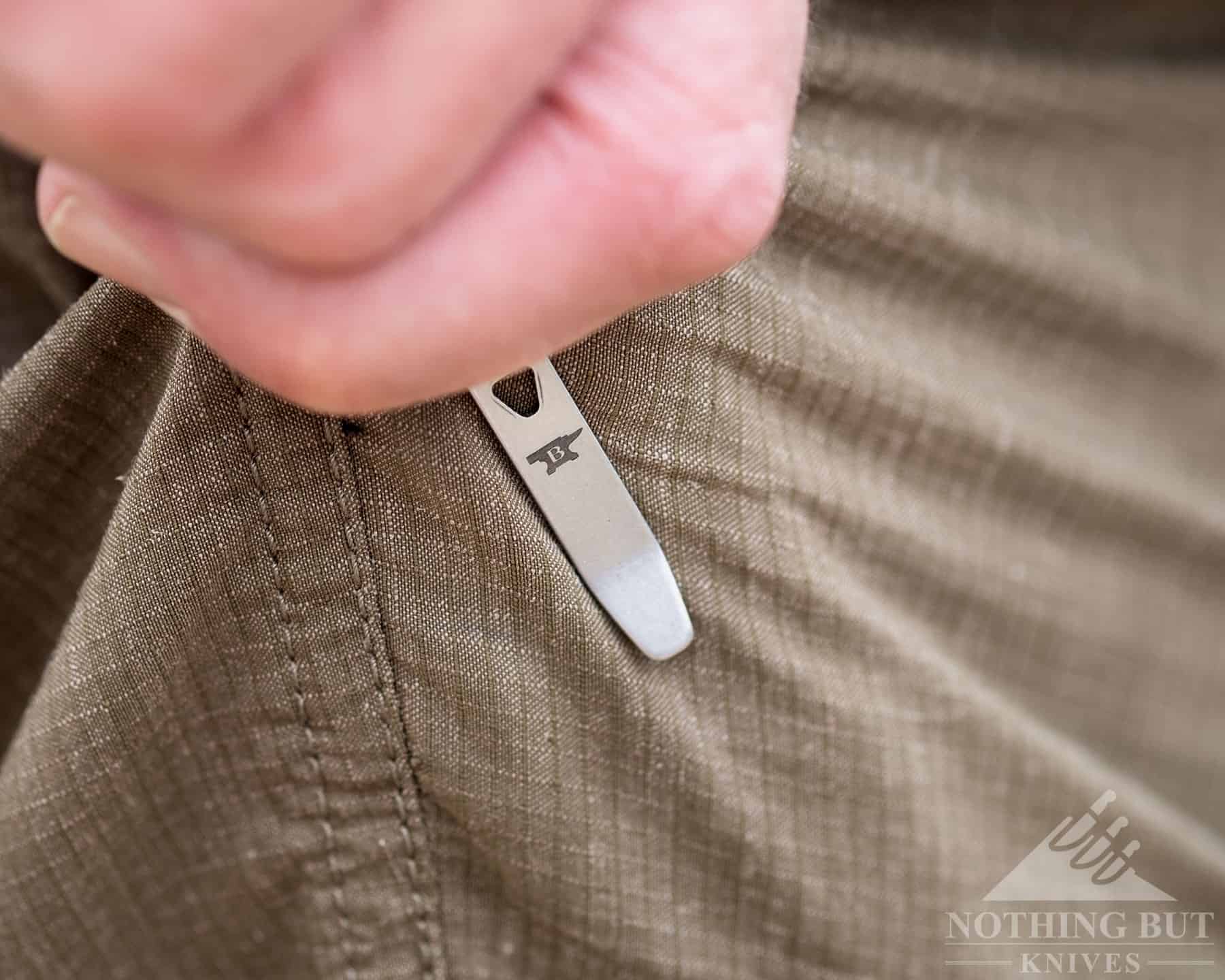 This image shows how tight the pocket clip is when the knife is new. 