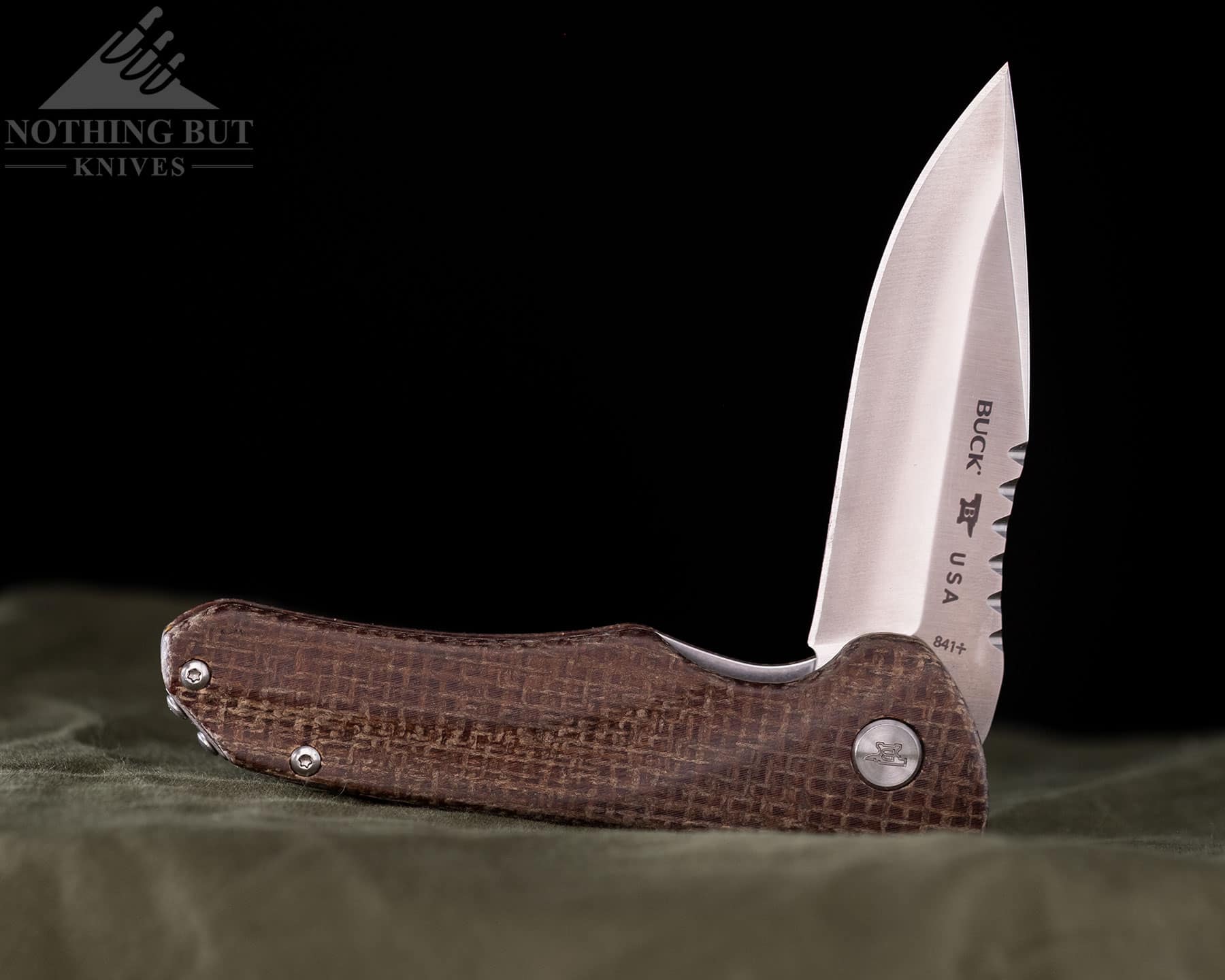 The Buck Sprint Pro folding knife in the half open position. 