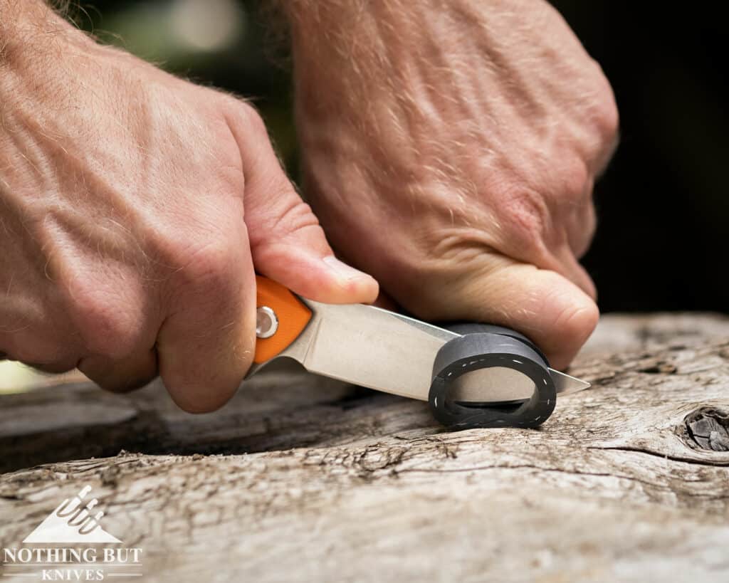 Revo Warden V2 Knife Review - Image 5 The Warden 2 easily sliced through the tough rubber tube pictured here.