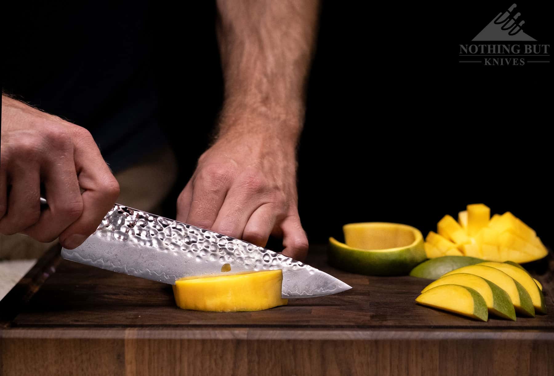 This image shows that the Shun Premier can cut through the hard core of a cantaloupe, but it should be done carefully to avoid damaging the blade.  