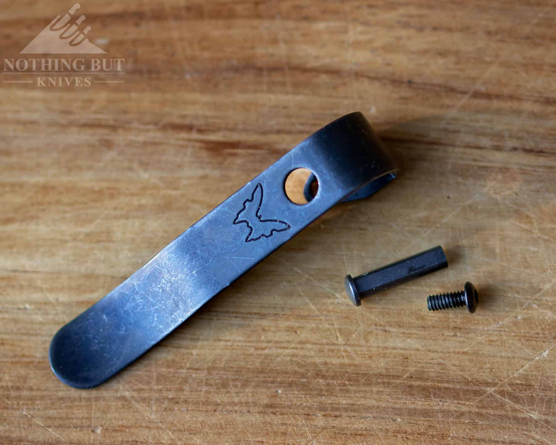 Macro image of the Benchmade Redoubt pocket clip with its screws.