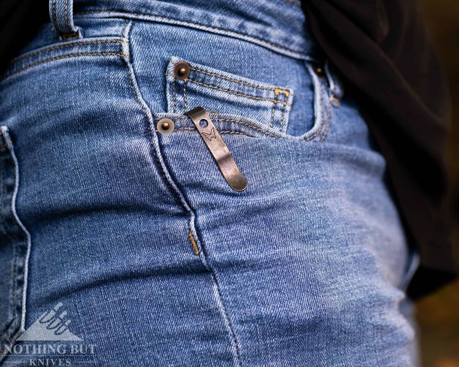 The deep carry Benchmade pocket clip in a person's pocket.
