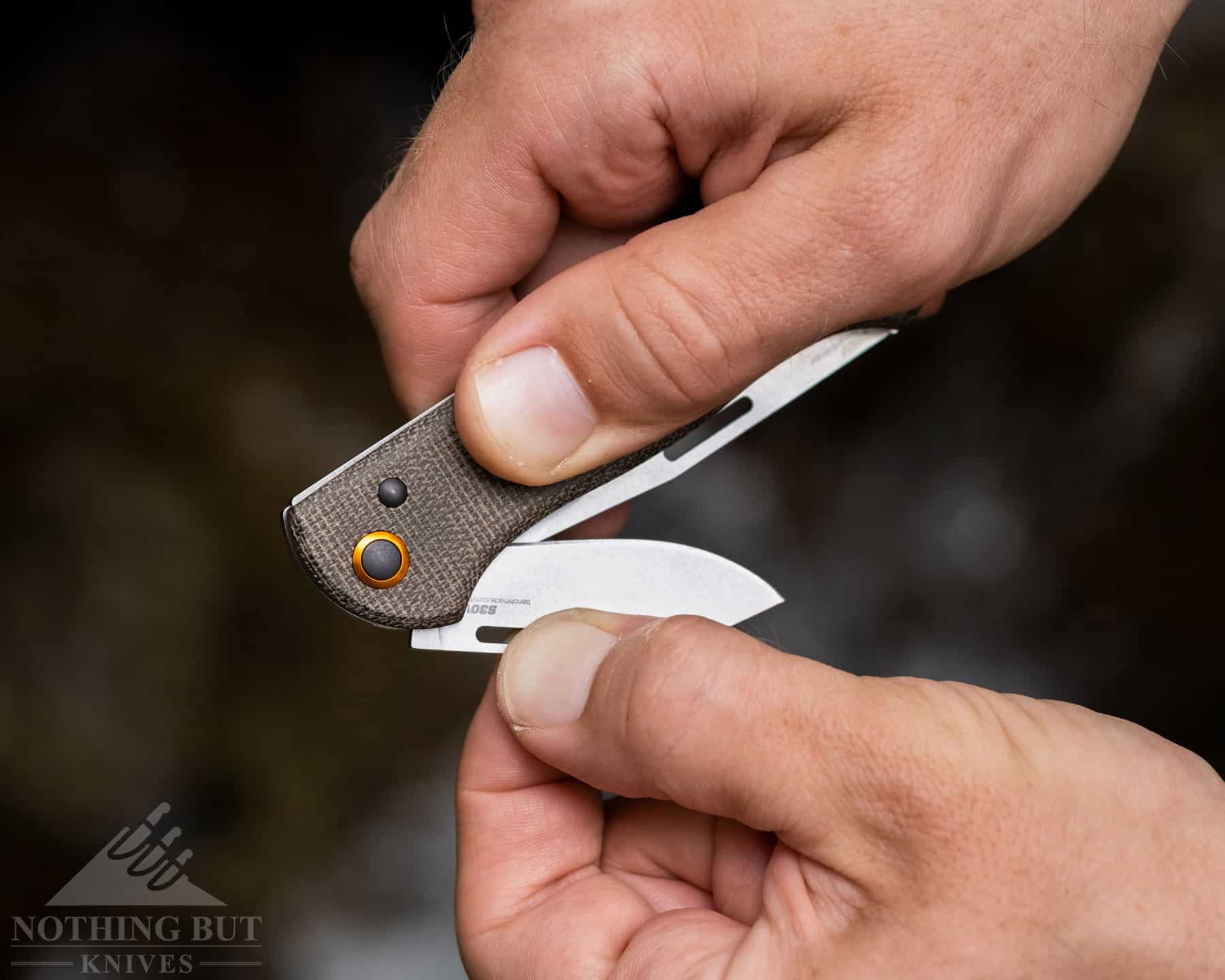 Benchmade Weekender Review - Image 6 The nail nicks in the Weekender's blade provide enough traction to easily open the blades in spite of the strong tension from the spring.