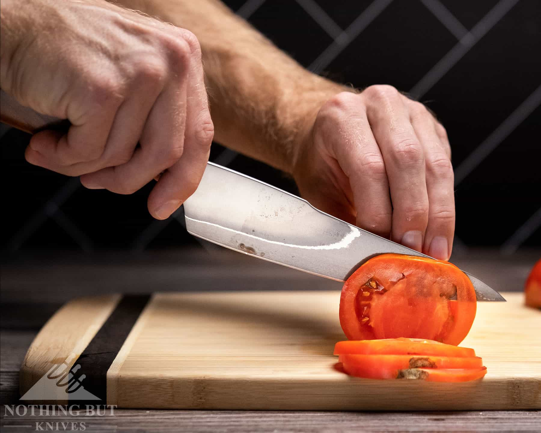 The XinCraft 8.4 inch petty chef knife looks like a Gyuto style chef knife, but it cuts more like a Western style chef knife.