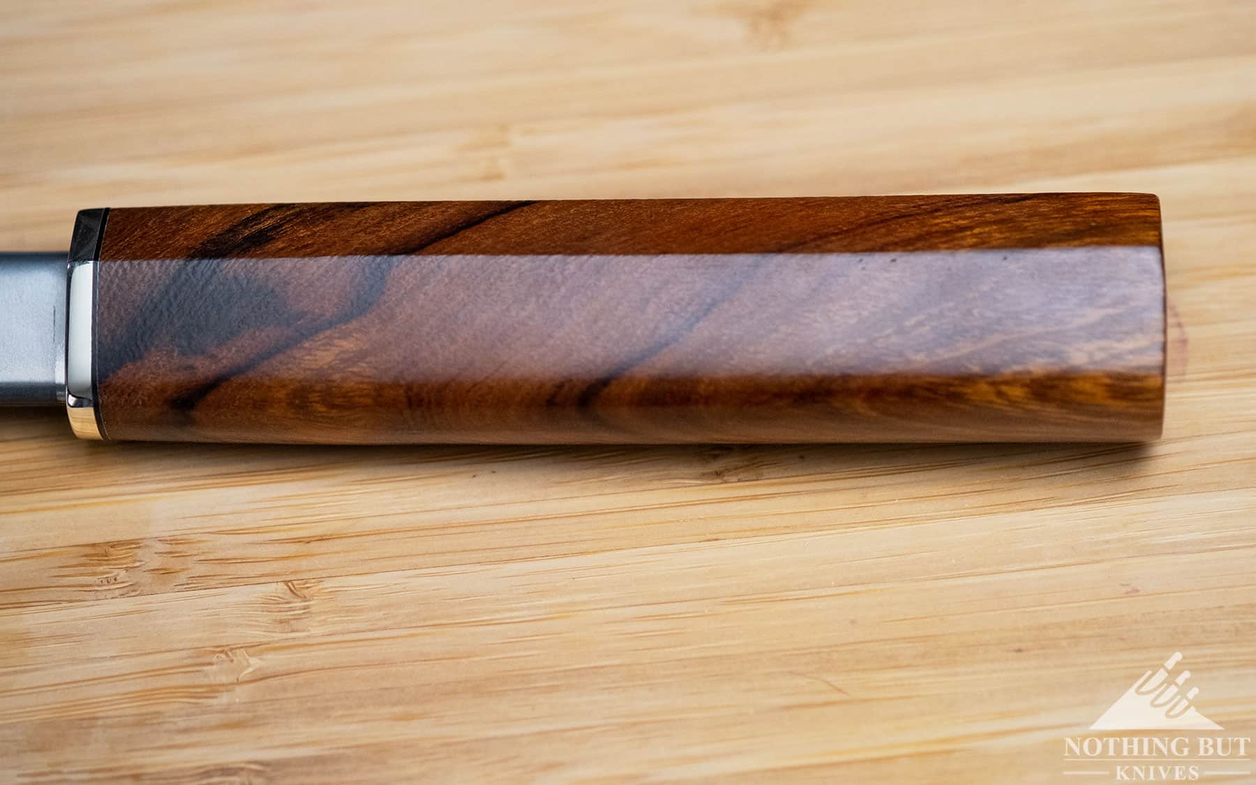 A close-up of the XinCraft 8.4 inch chef knife handle to chow its shape.