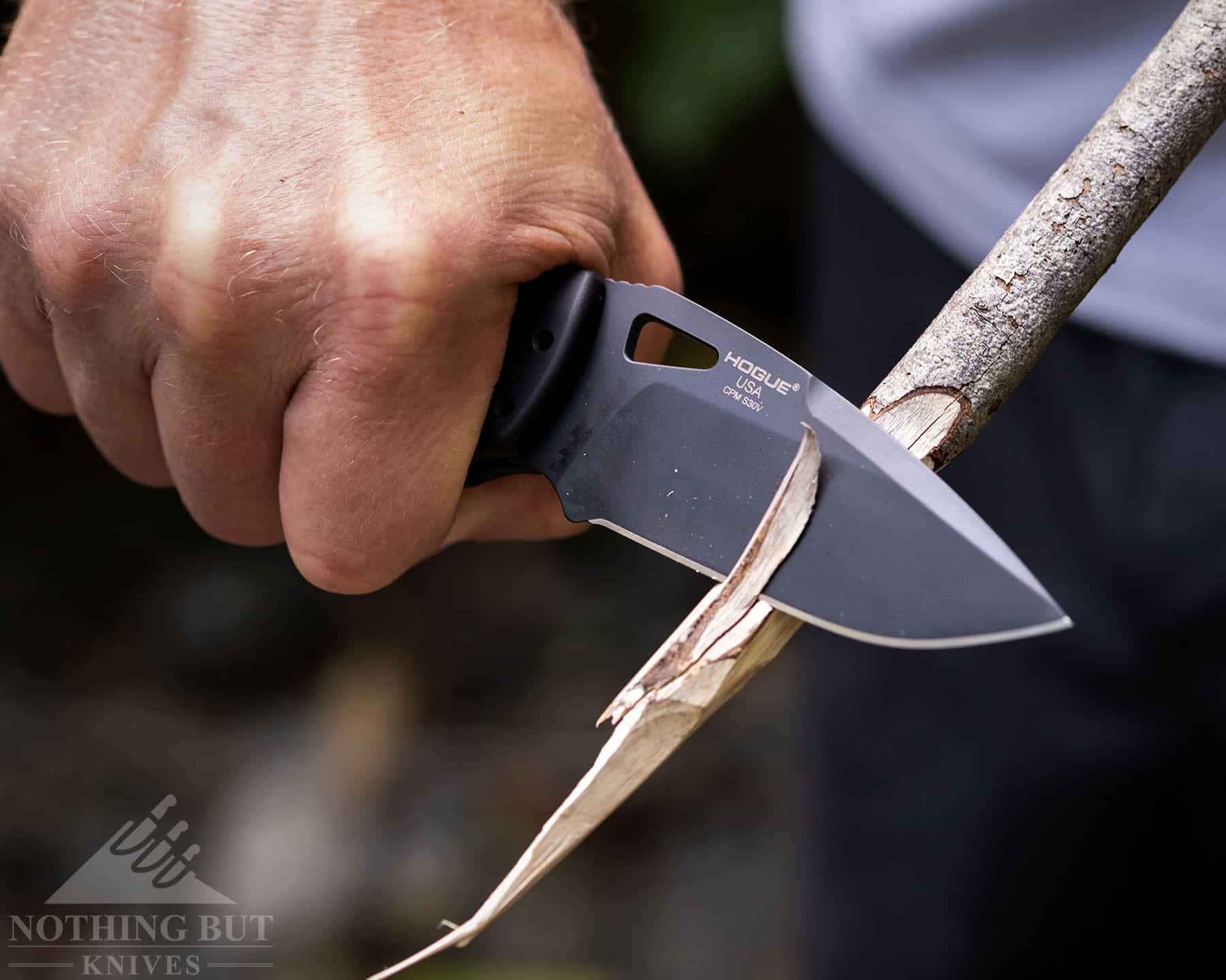 Testing the blade of the Hogue SIG K320 AXG Pro knife.