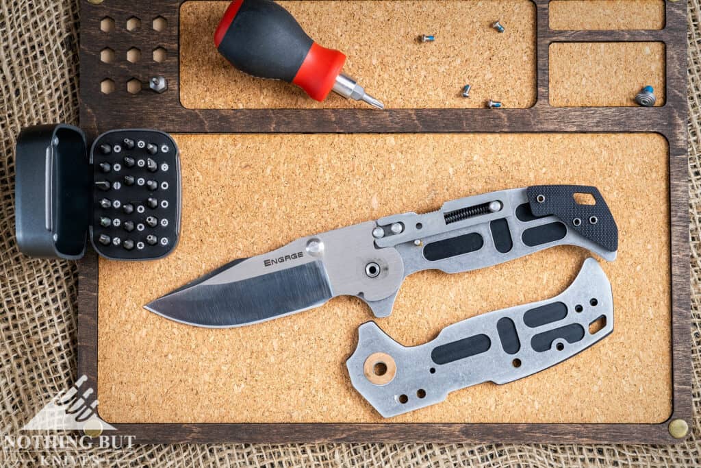 The Cold Steel Engage folding knife disassembled to show how the ATLAS Lock works.
