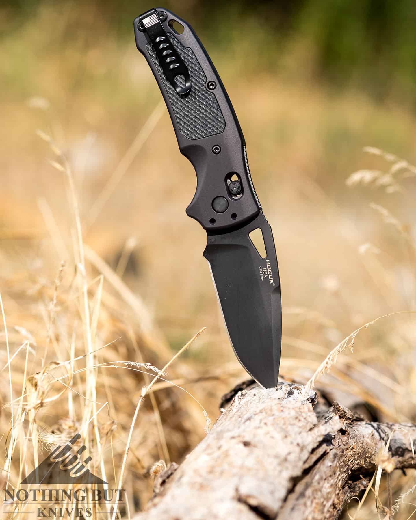 The Hogue K320 tactical knife is right  at home in the great outdoors. 
