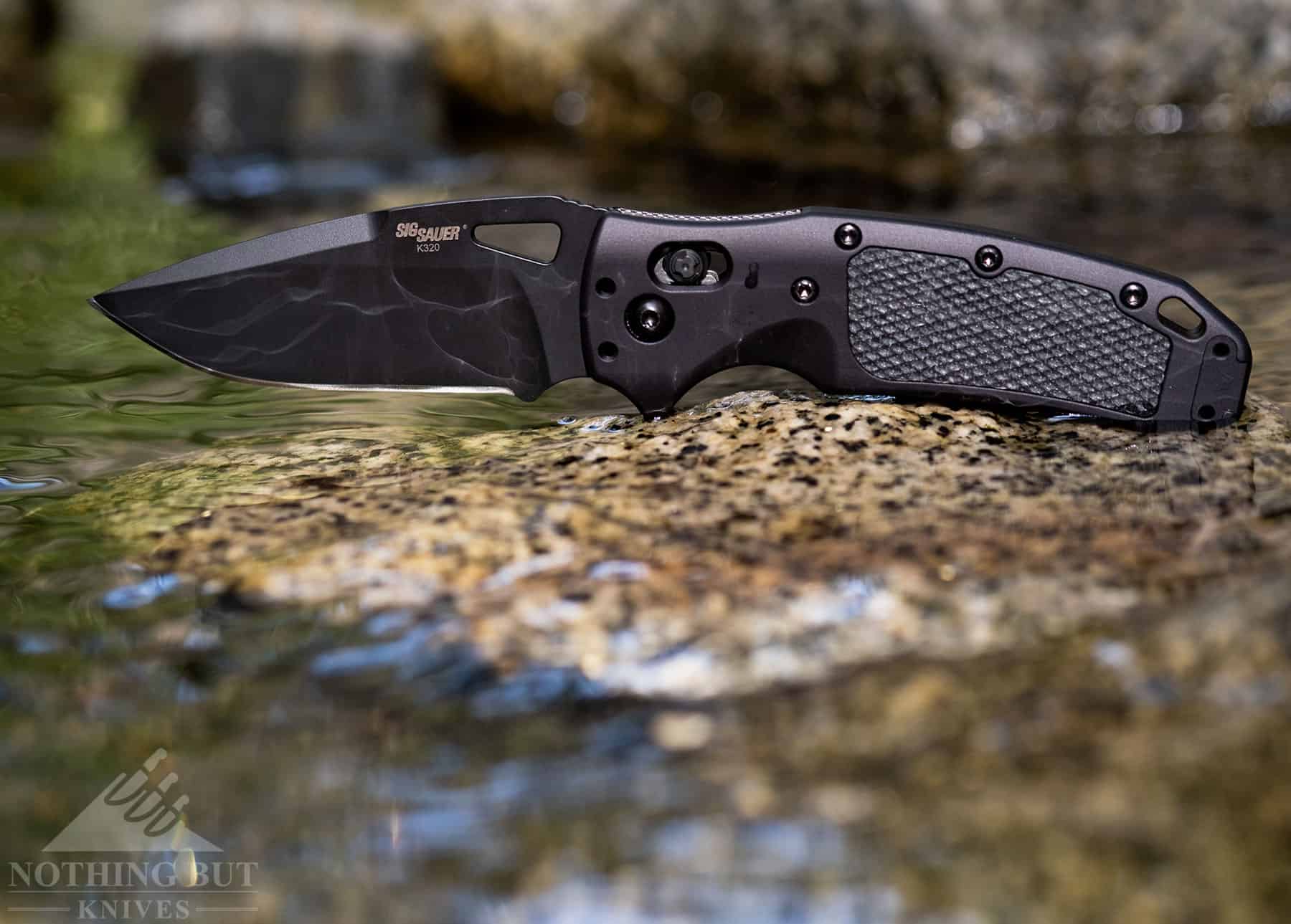 The Hogue K320 AXG Pro is a capable tactical knife that doubles as a decent hiking and camping knife.