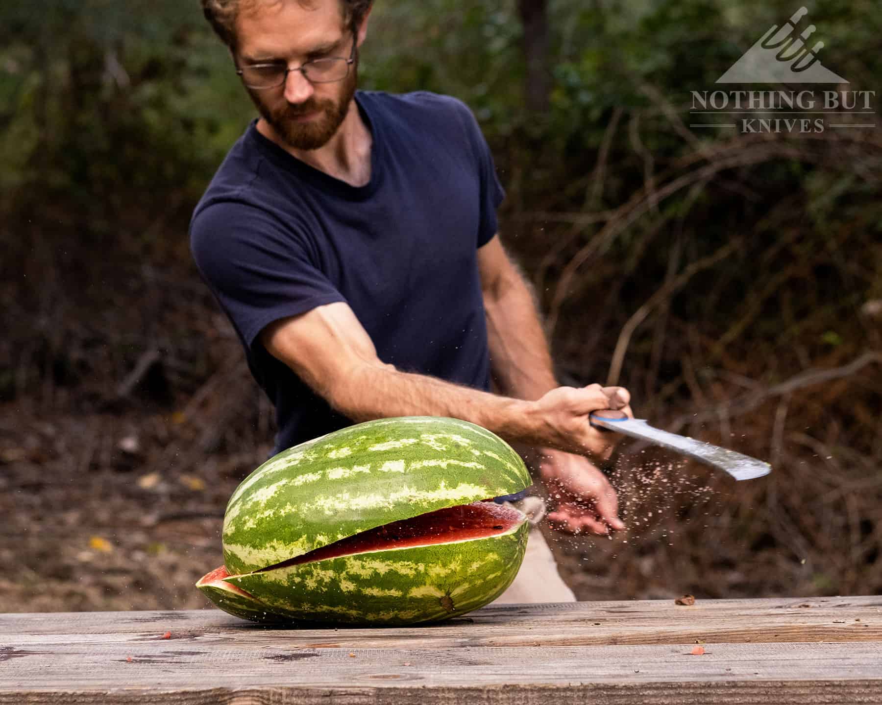 Work Tuff Gear Apex Review - Image 7 The Apex is surprising good at slicing as this photo of a person slicing through a watermelon shows.