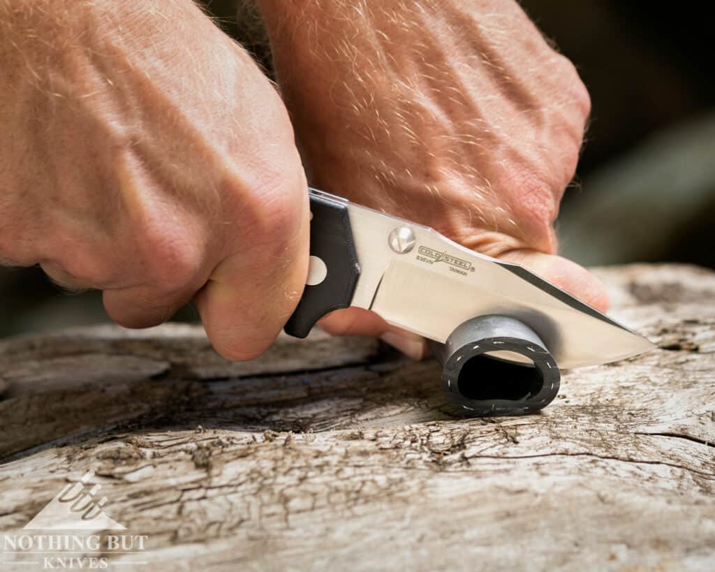 Cold Steel Engage Review - Image 12 The Engage easily sliced through tough rubber tubing.