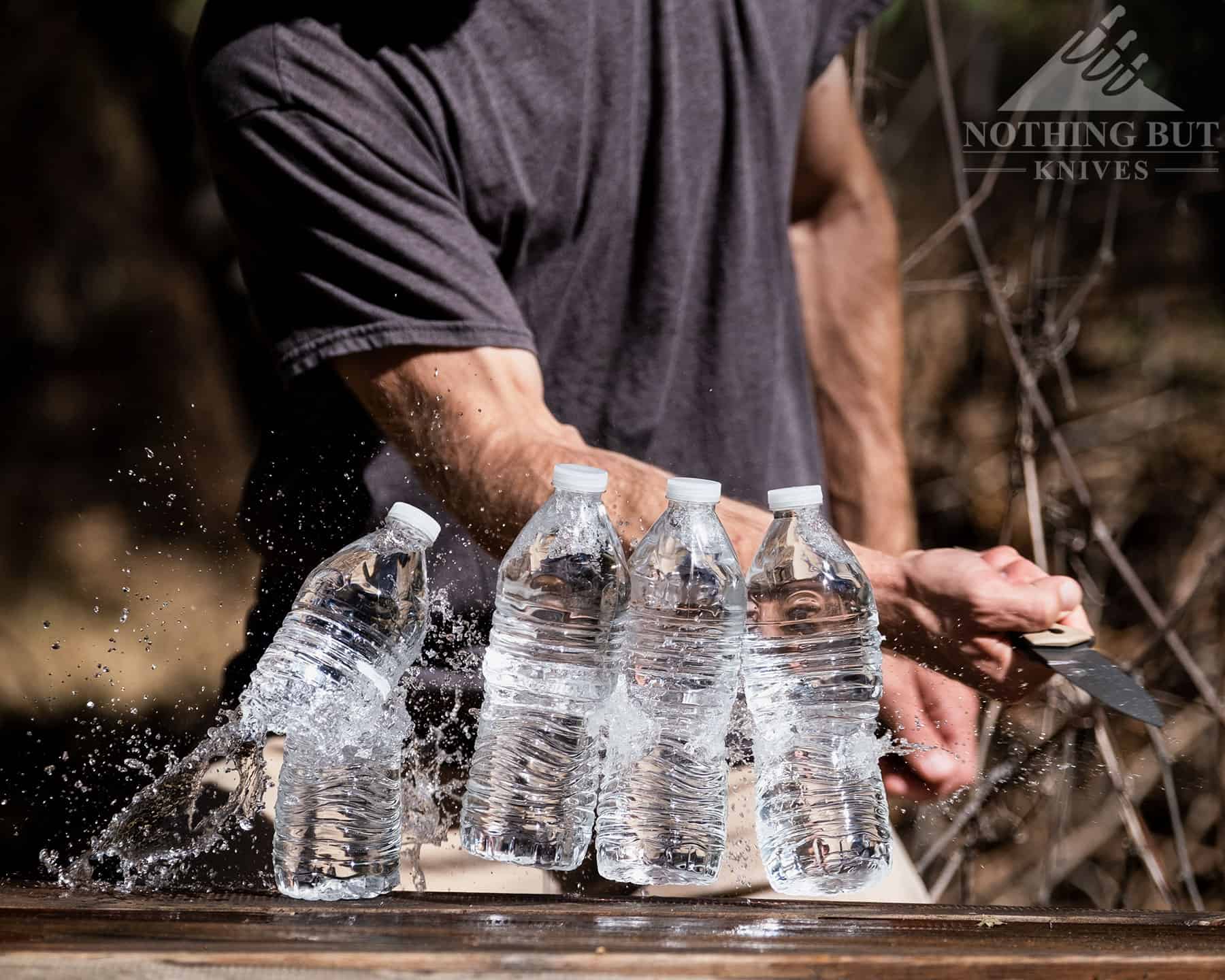 Off Grid Stinger Xl Review - Image 3 Slicing four water bottles with the Off-Grid Enforcer XL was pretty easy.