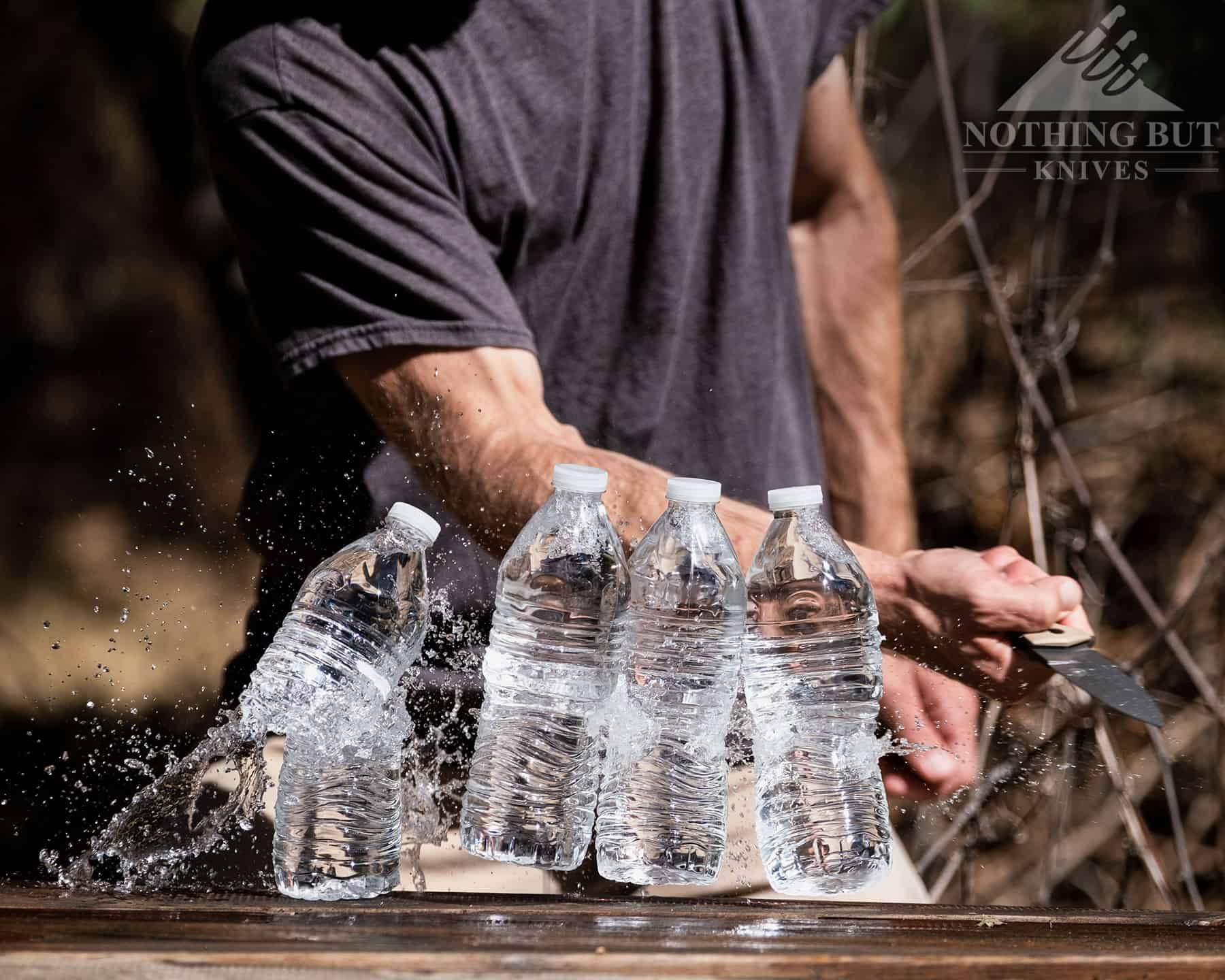 Slicing four water bottles with the Off-Grid Enforcer XL was pretty easy.