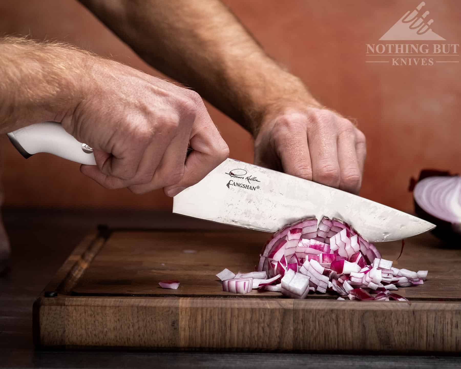 Cangshan Thomas Keller Chef'S Knife Review - Image 5 The Cangshan Thomas Keller Signature Collection chef knife cuts effortlessly though onions.
