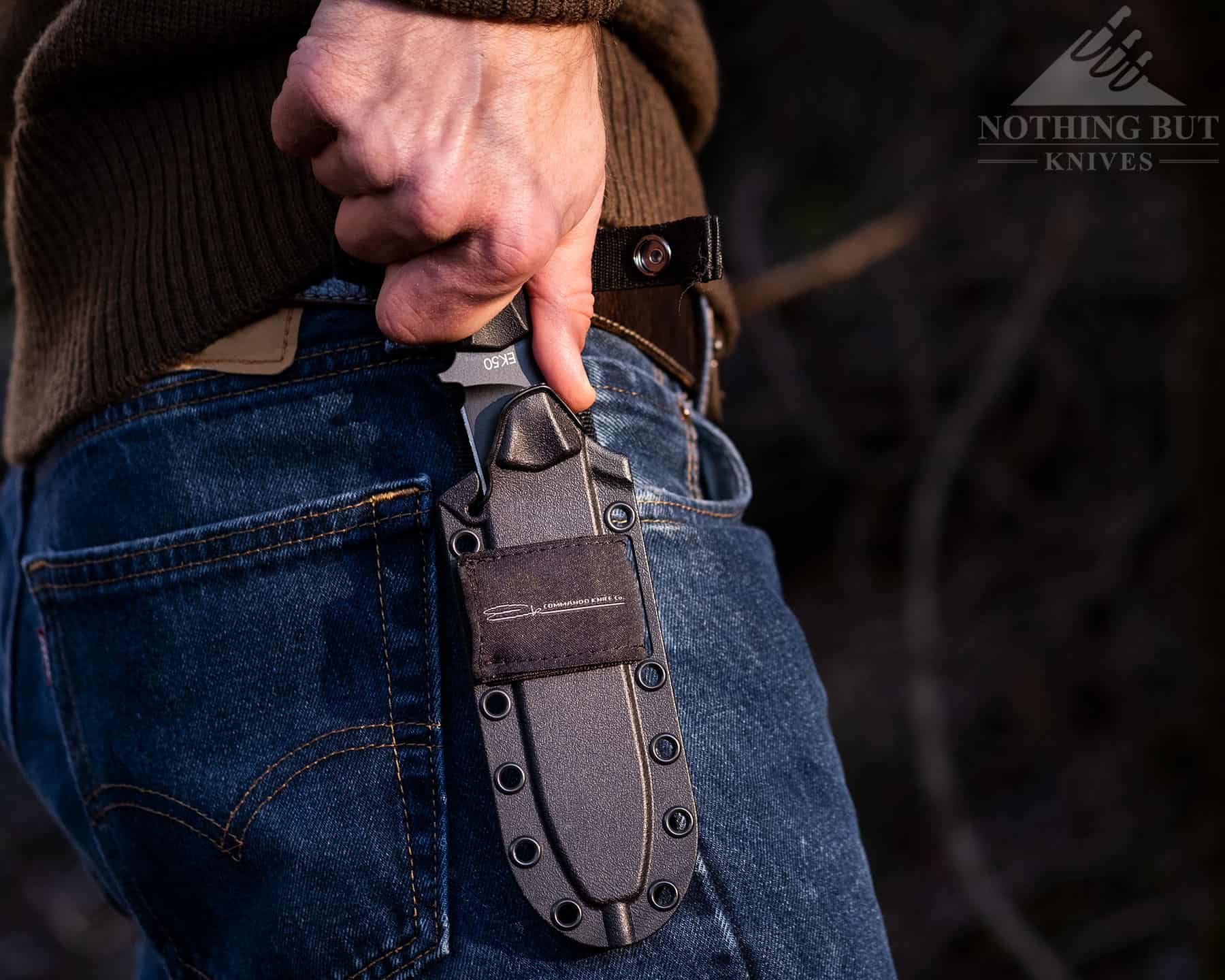 The Ka-Bar Ek Commando sheath holds the knife firmly in place, but it is not difficult to draw. 