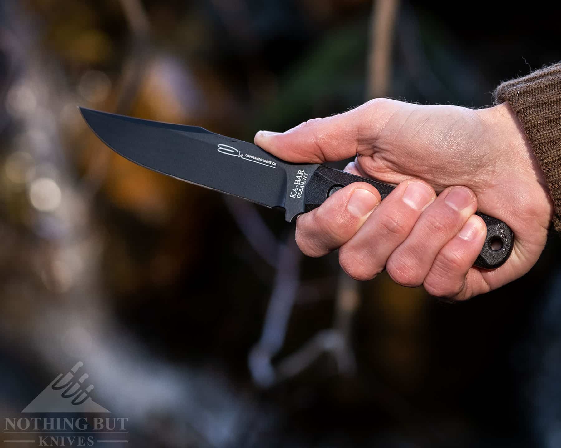 The job of keeping your hand in place falls to the cuts on the handle scales of the Ka-Bar Ek Commando Short Clip Point knife.