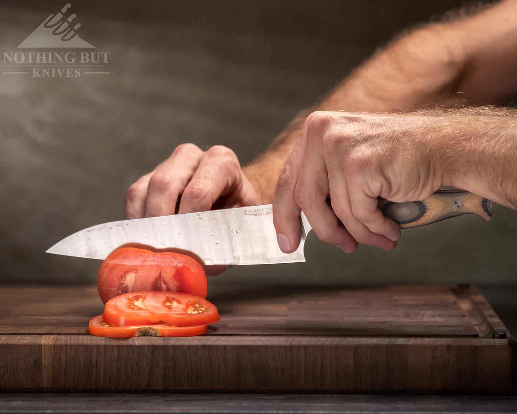 The Bradford 8 inch chef knife easily cut thin slices of tomato.  