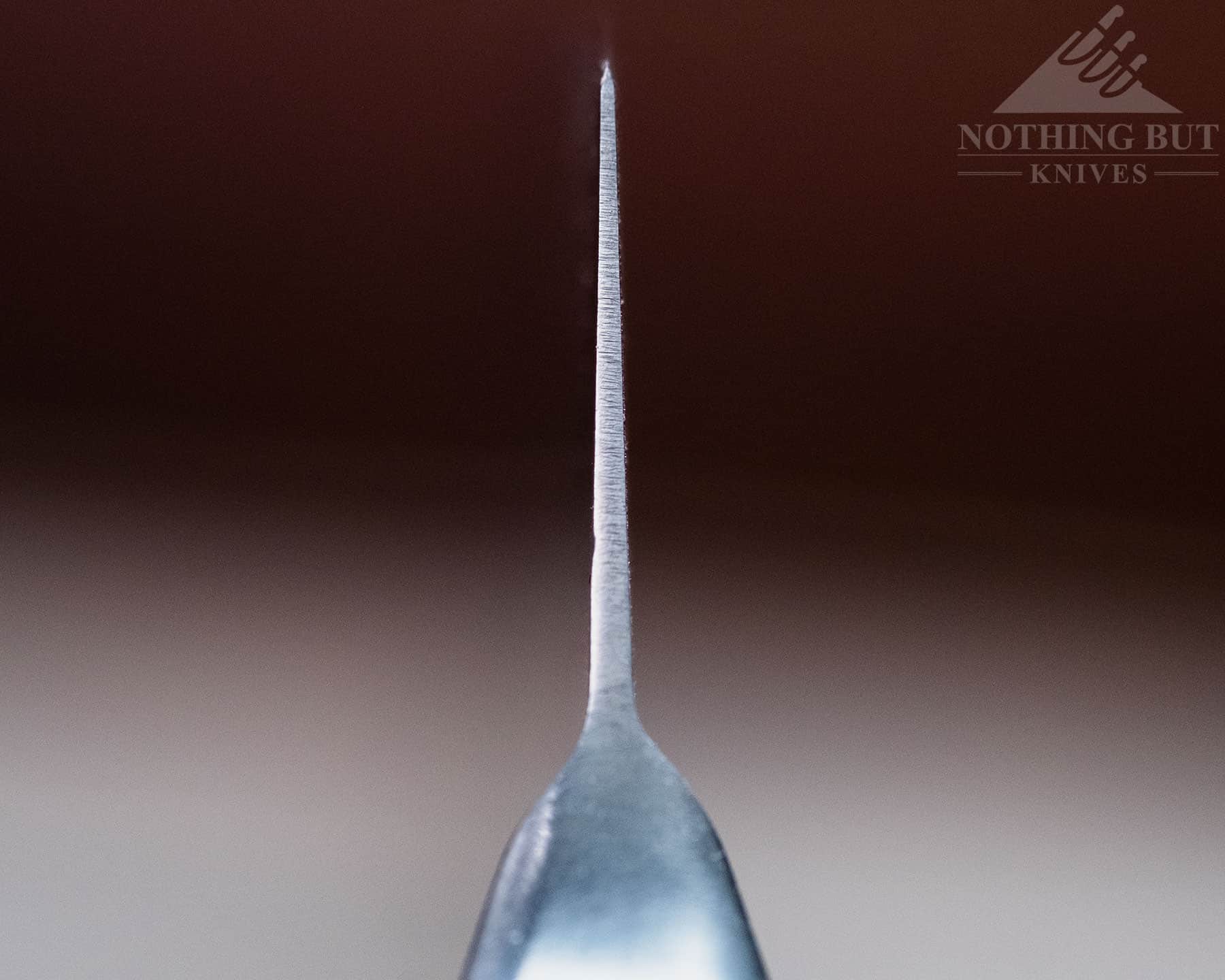 Cutluxe Artisan Chef'S Knife Review - Image 3 The blade grind of the Artisan 8 inch chef knife is relatively even.