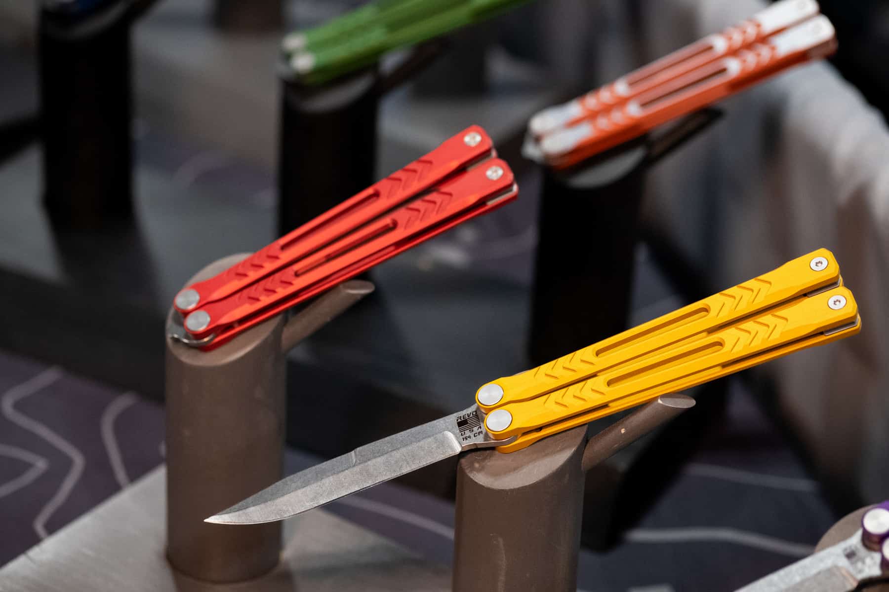Shot Show 2023 Day 2 - Image 3 A few different versions of the Revo Buttlerfly knife at SHOT Show 2023.