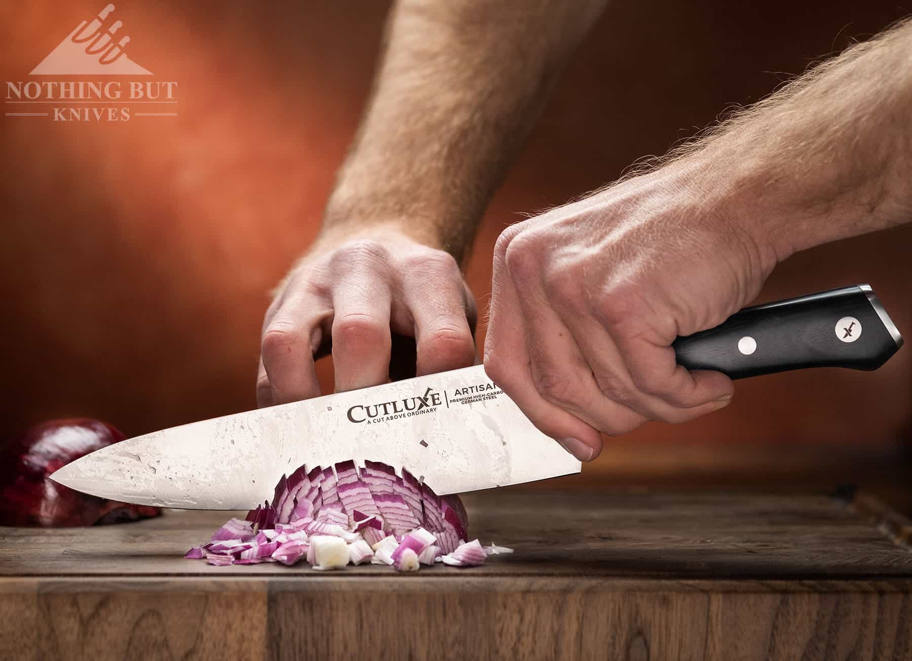 The Cutluxe Artisan chef knife slices and dices onions with minimal wedging. 