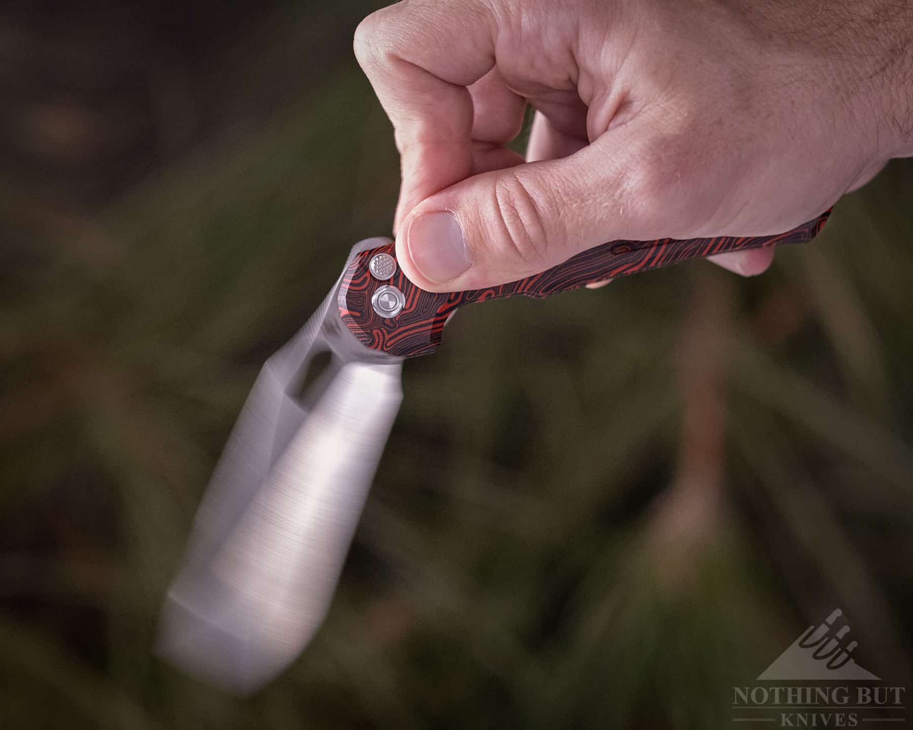 The Thunderbird has a conventional flipper tab for those who prefer classic opening methods.
