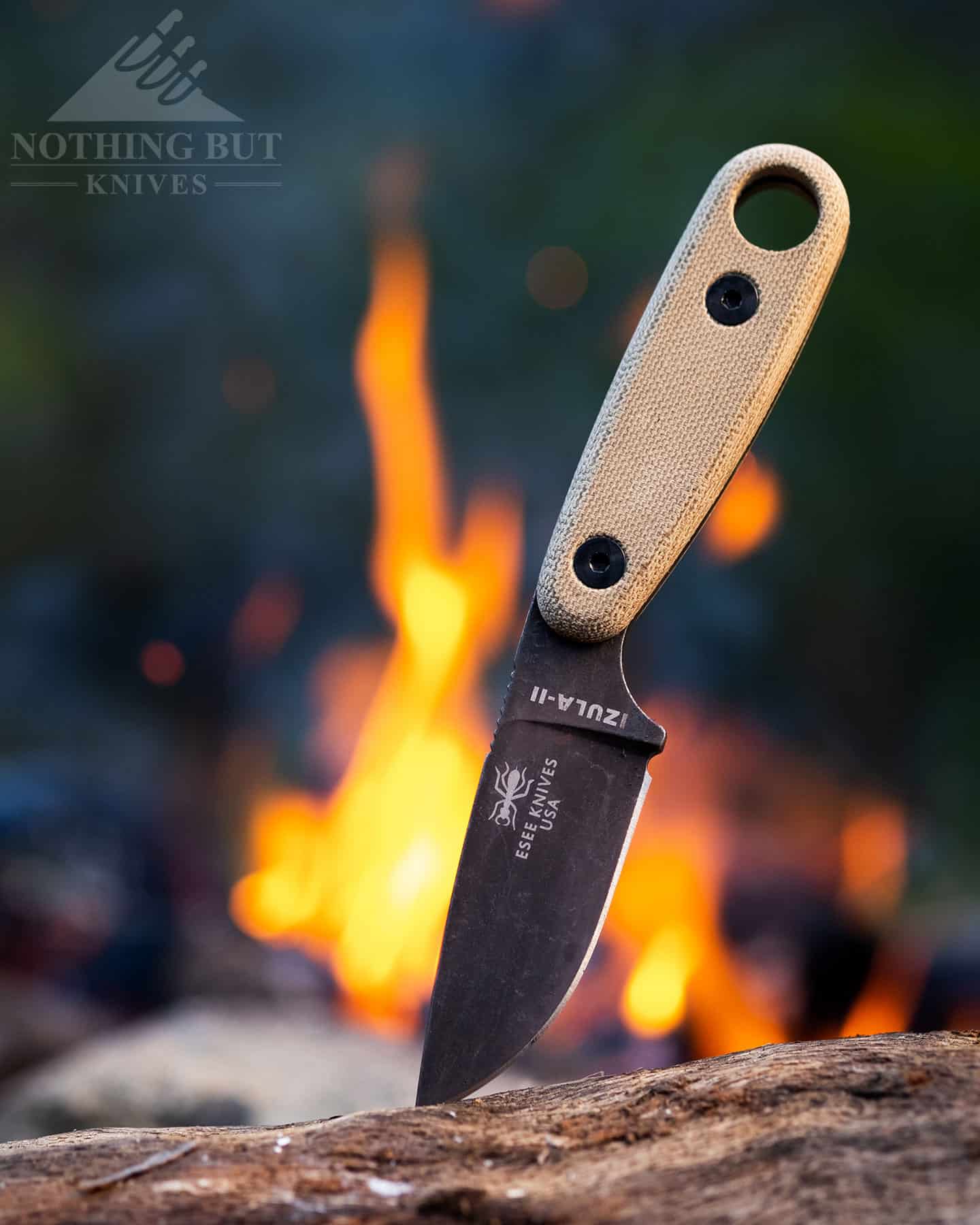 The Esee Izula 2 is a popular survival knife in part due to the fact that its sheath is versatile.