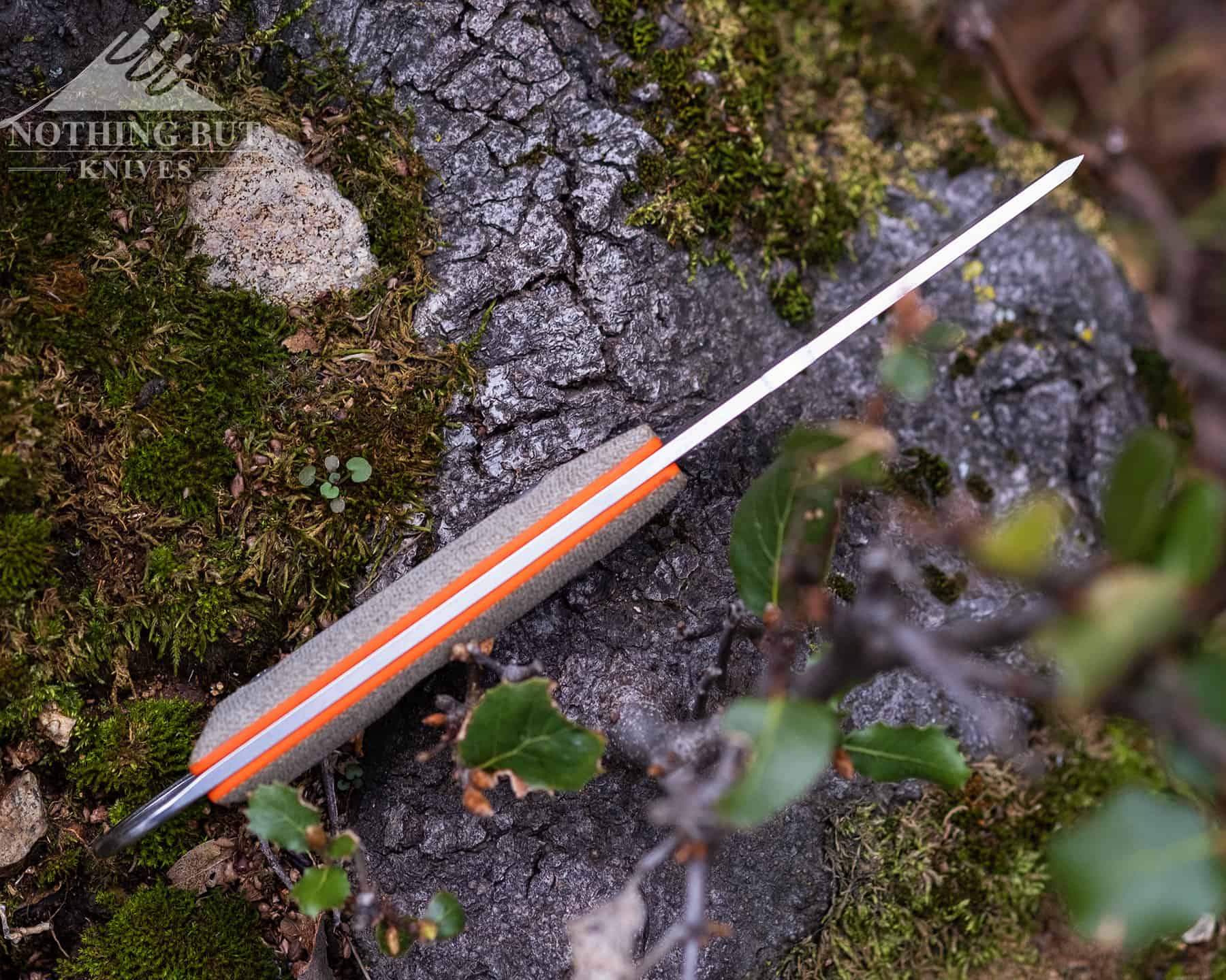 While White River isn't a brand known for ostentatious design, they will add accents--like these orange liners under the more subdued micarta scales.