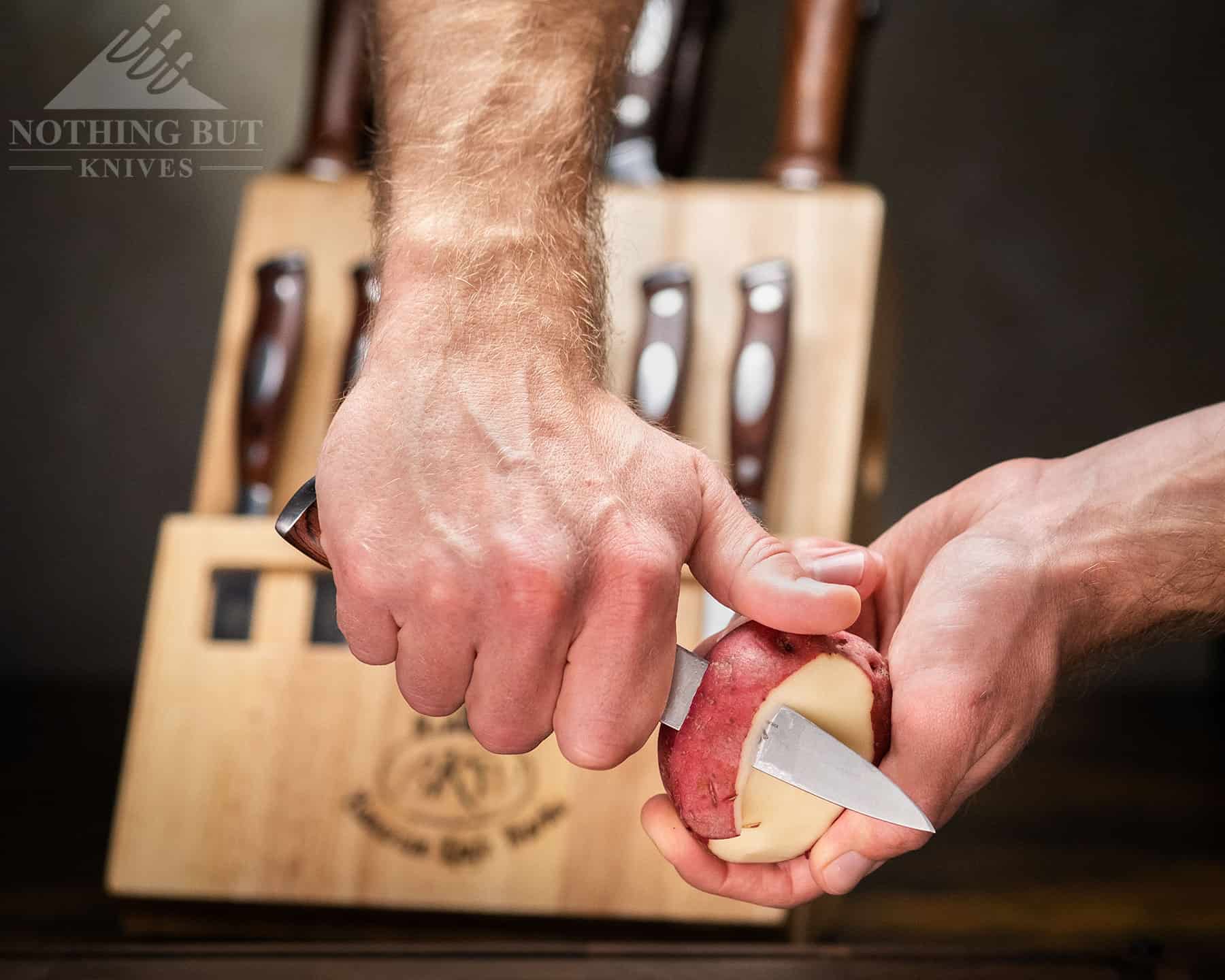 The comfort of the Bavarian Knife Works knives helps with detailin work like peeling an apple. 