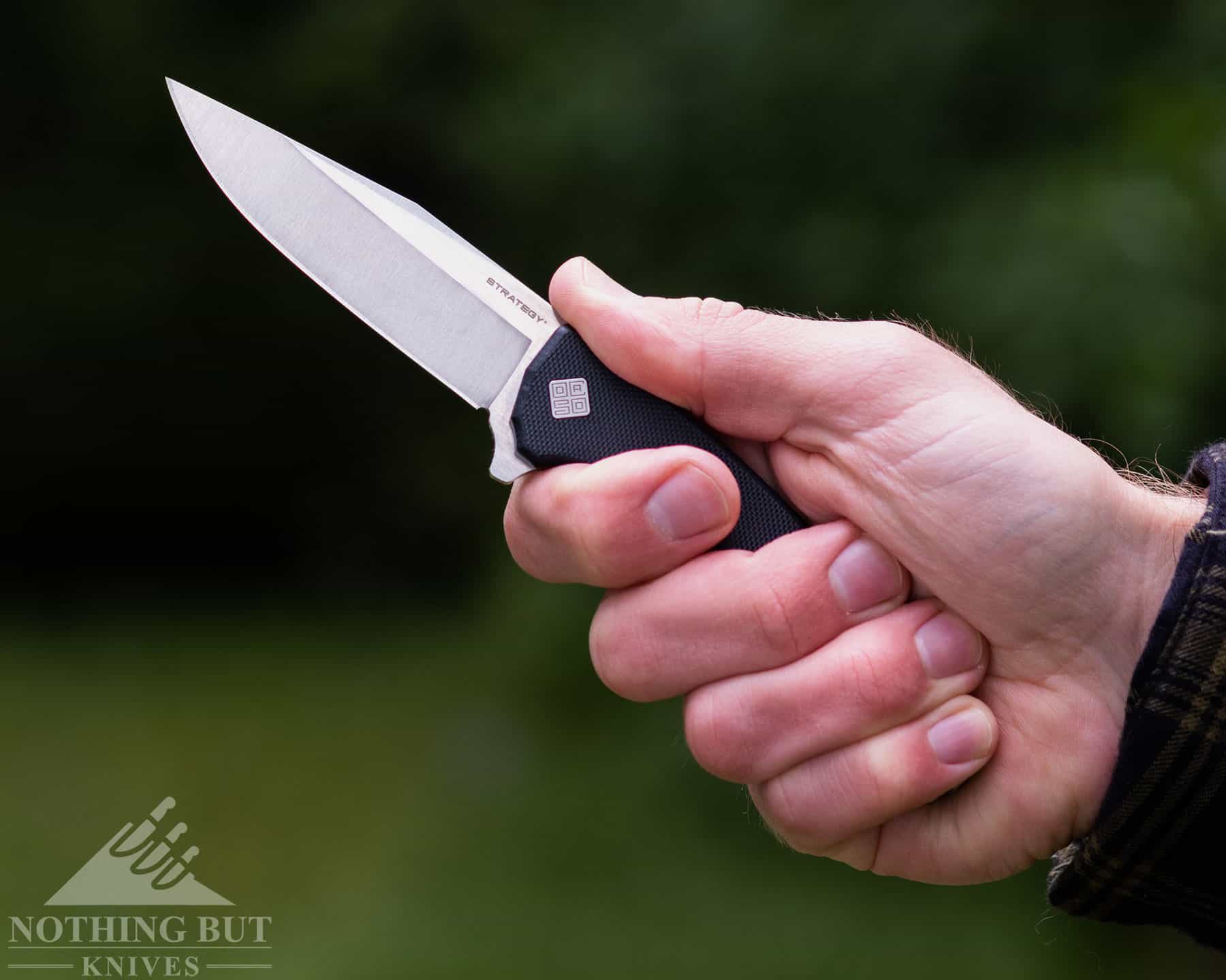 The Strategy is not  large knife, but the ergonomic handle accommodates four fingers well. 