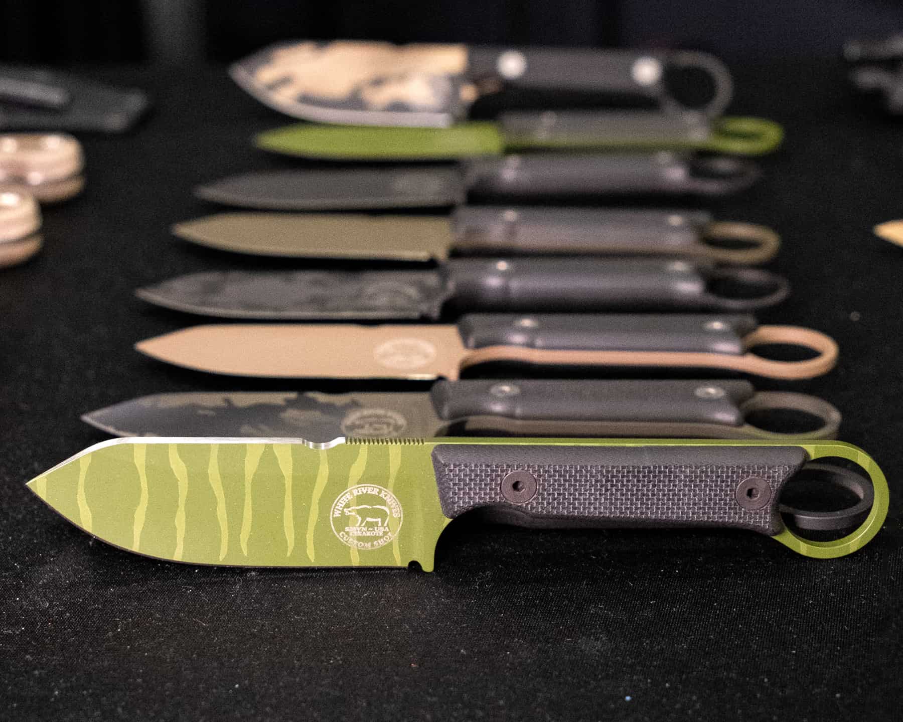 Our Incomplete Coverage Of Blade Show 2023 - Image 17 Colorful Cerakote designs of the White River Knives Firecraft 3.5.